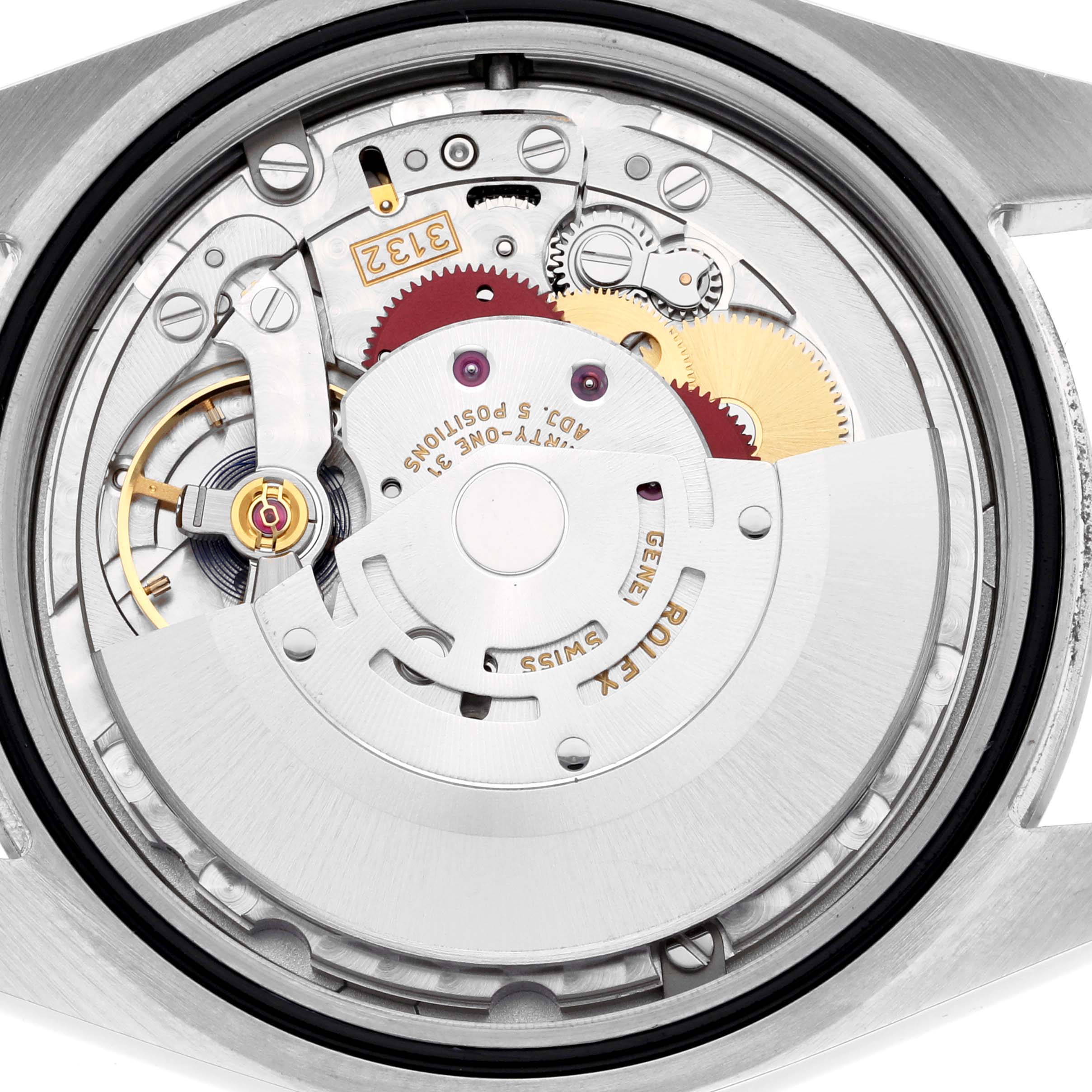 This image shows the movement from the back of a Rolex Oyster Perpetual 114300 Men's Stainless Steel Blue Dial 114300 Men's Stainless Steel Blue Dial watch, highlighting gears and mechanisms.