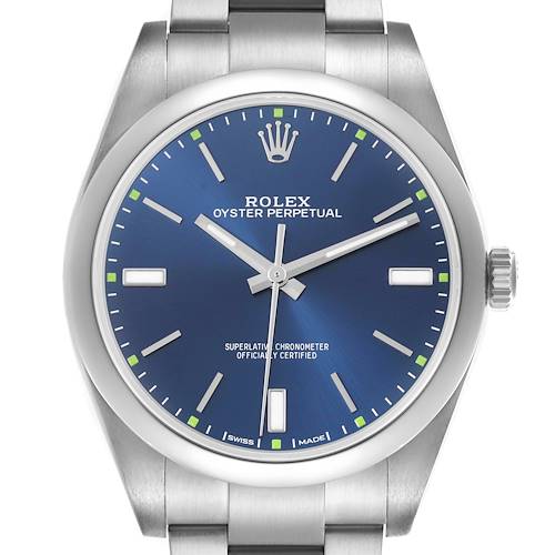 The Rolex Oyster Perpetual watch is shown from the front, highlighting the dial, hands, and a portion of the bracelet.