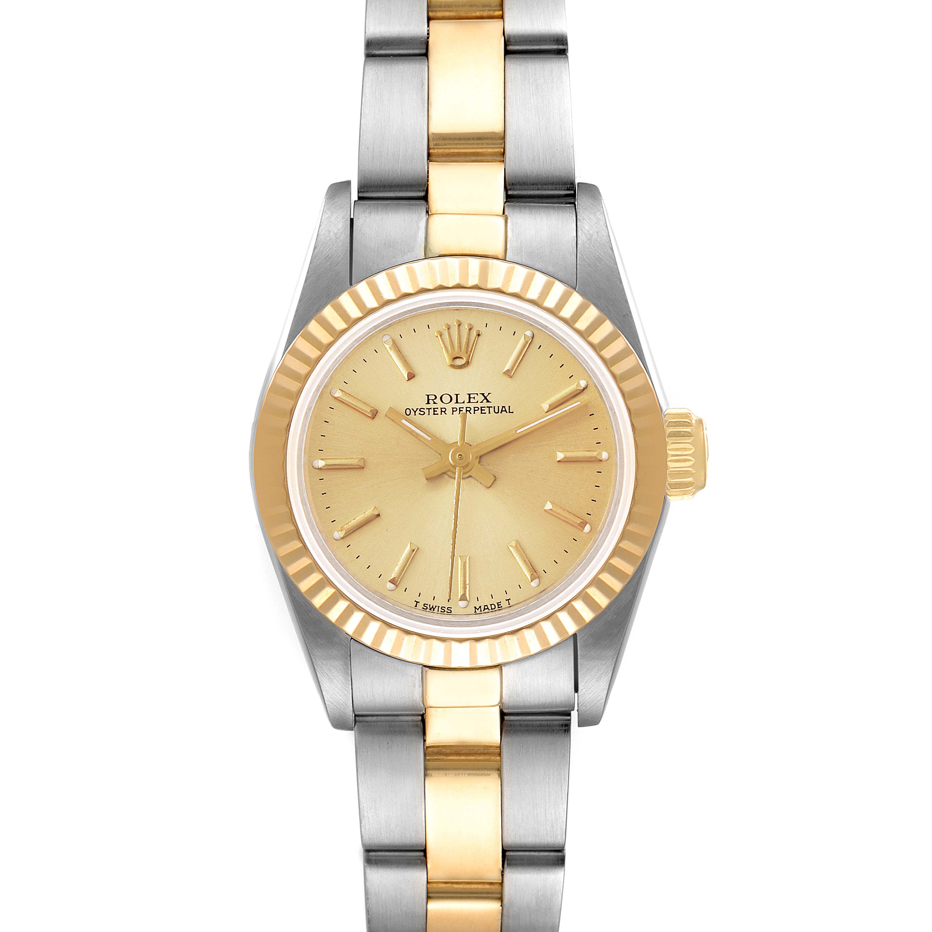 The Rolex Oyster Perpetual 67193 Women
s Steel and Gold (two tone) Champagne Dial 67193 Women
s Steel and Gold (two tone) Champagne Dial watch is shown head-on, highlighting its gold and silver face, bezel, and bracelet.