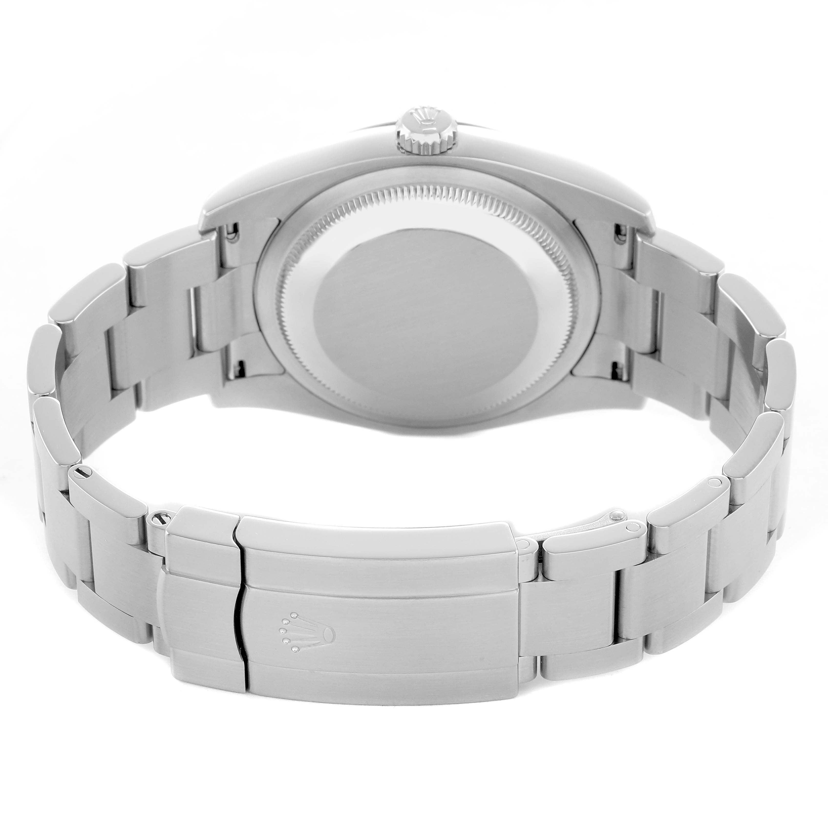 The Rolex Oyster Perpetual 116034 Men's Stainless Steel Silver Dial watch is shown from the back, highlighting the case back, crown, and bracelet clasp.