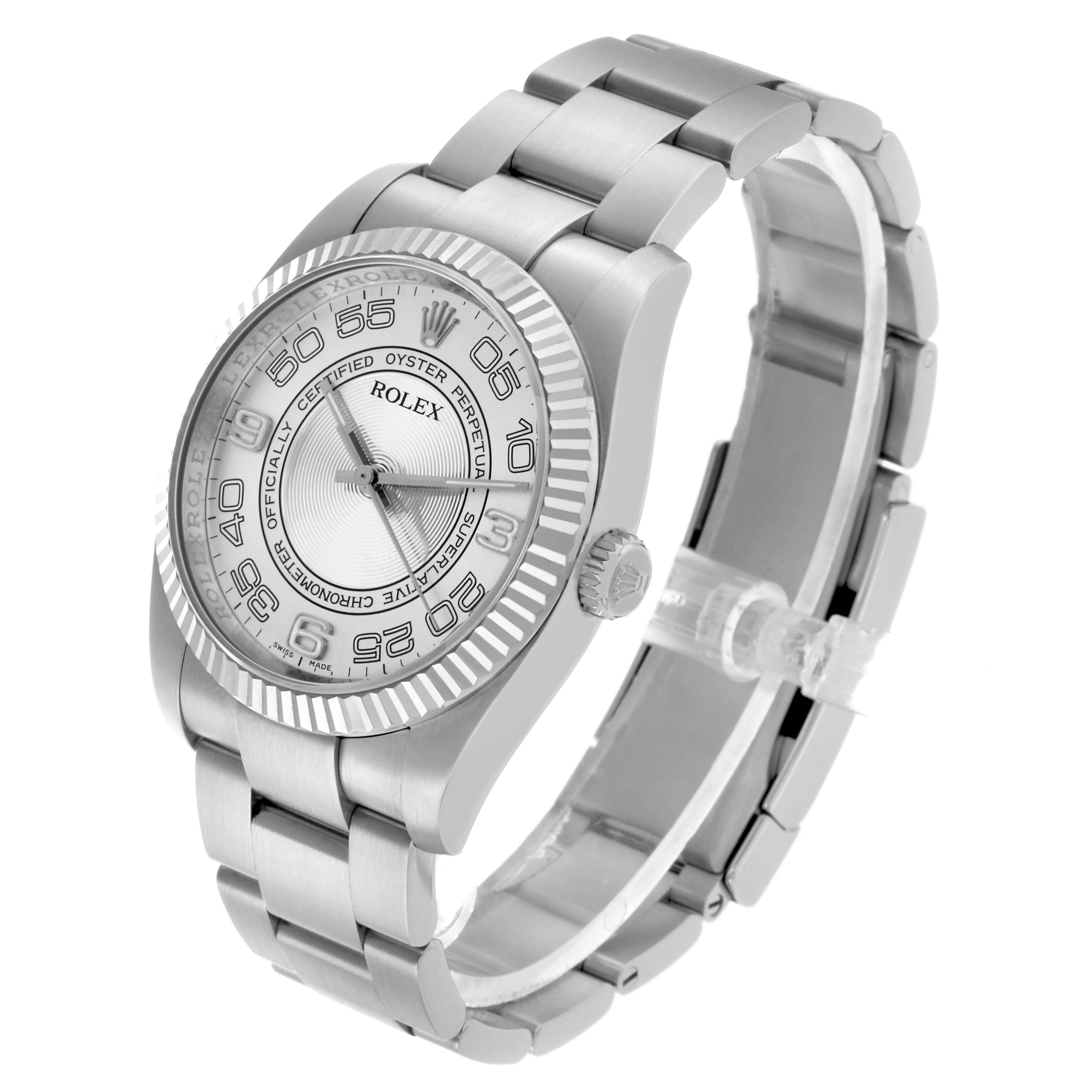 The Rolex Oyster Perpetual 116034 Men's Stainless Steel Silver Dial watch is shown at a three-quarter angle, displaying the dial, fluted bezel, and bracelet.