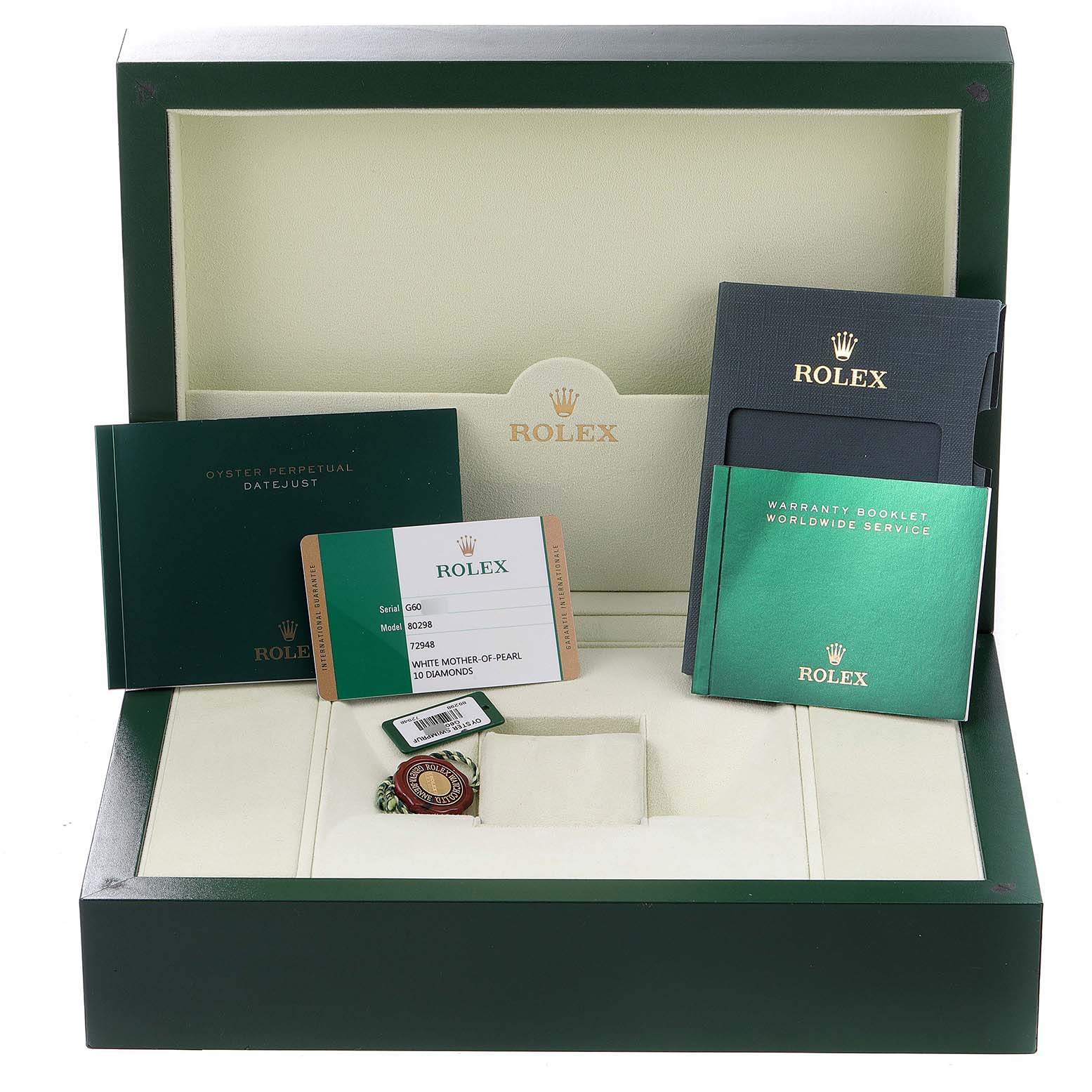 The image shows the open packaging of a Rolex Pearlmaster 80298 Women's Yellow Gold Mother of Pearl Dial 80298 Women's Yellow Gold Mother of Pearl Dial watch, including booklets, a warranty, a tag, and an empty slot for the watch.