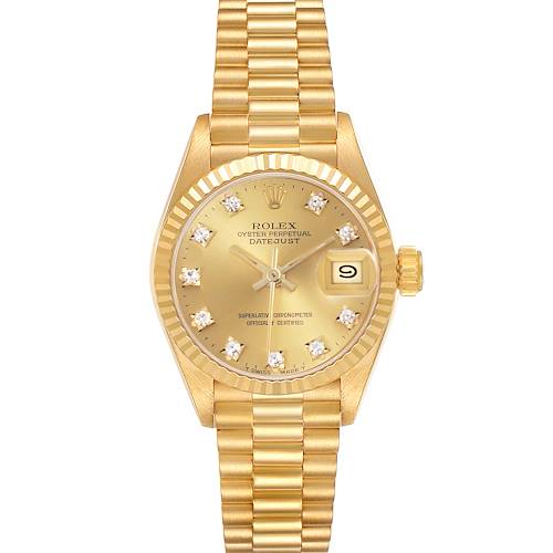 The Rolex President model is shown from a top-down angle, highlighting its gold dial, diamond markers, and bracelet.