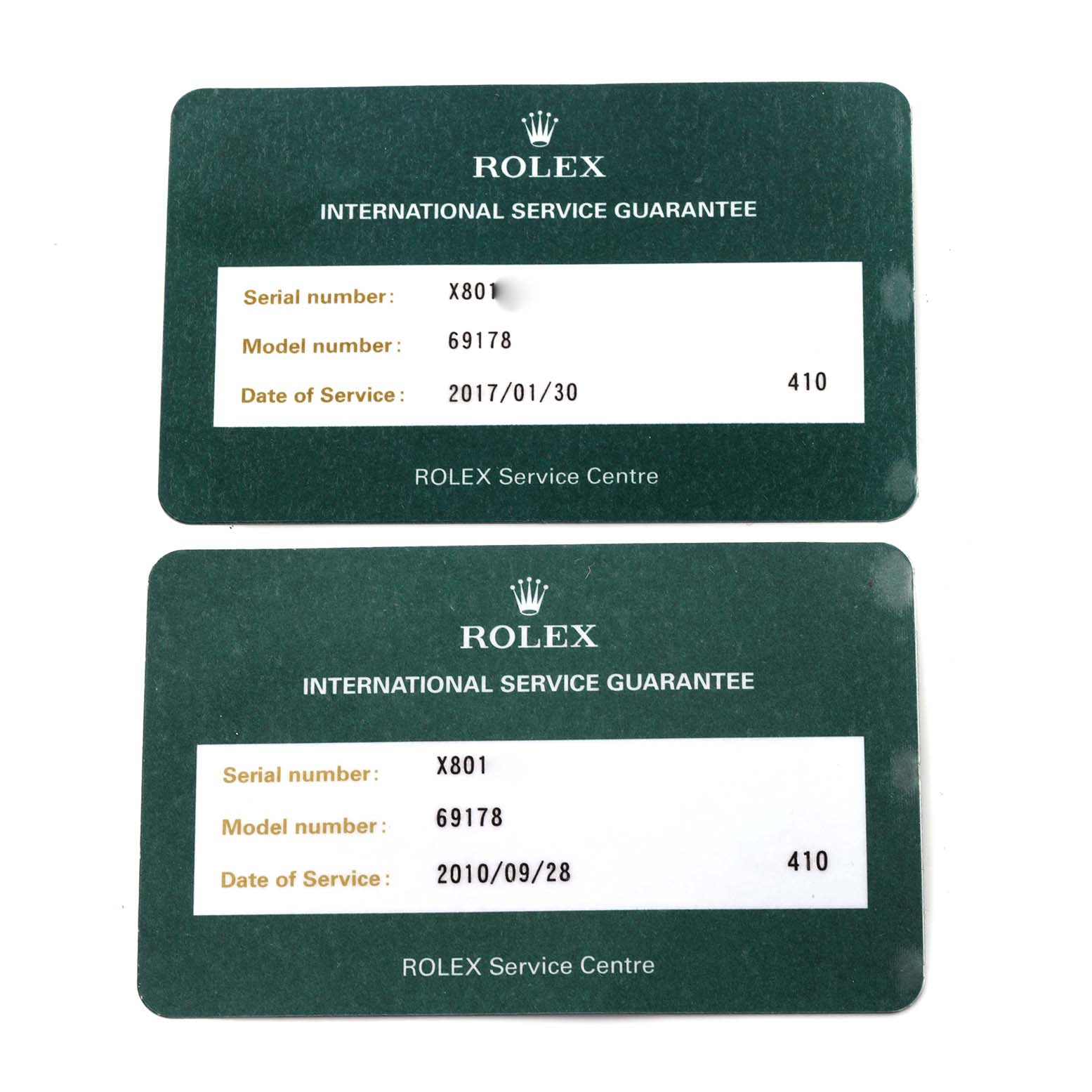 The image shows two Rolex International Service Guarantee cards for the President model.