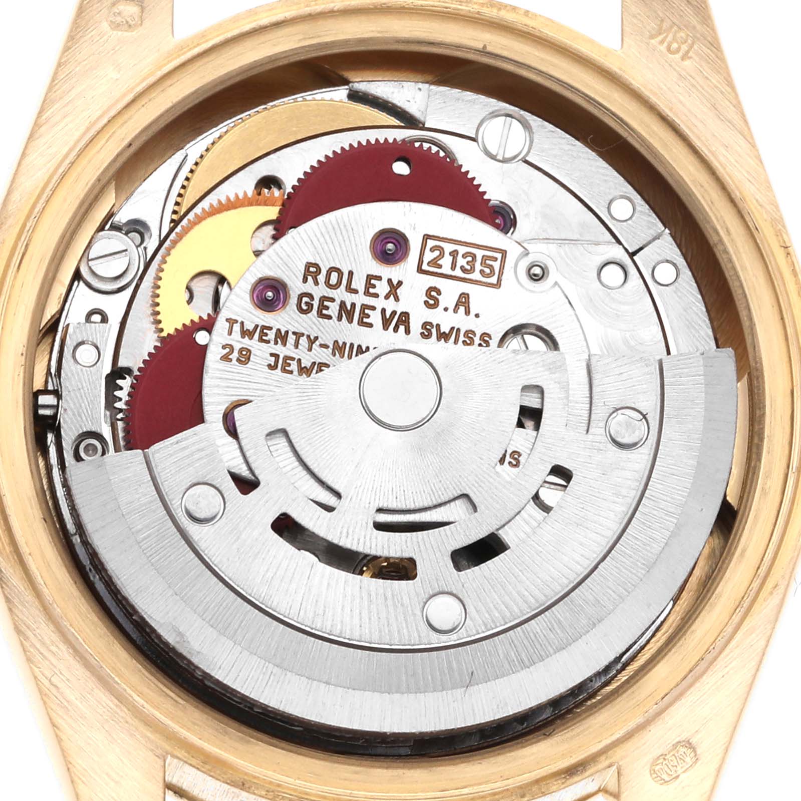 The image shows the movement of the Rolex President 69178 Women's Yellow Gold Champagne Dial 69178 Women's Yellow Gold Champagne Dial model from the back, displaying its intricate gears and rotor.