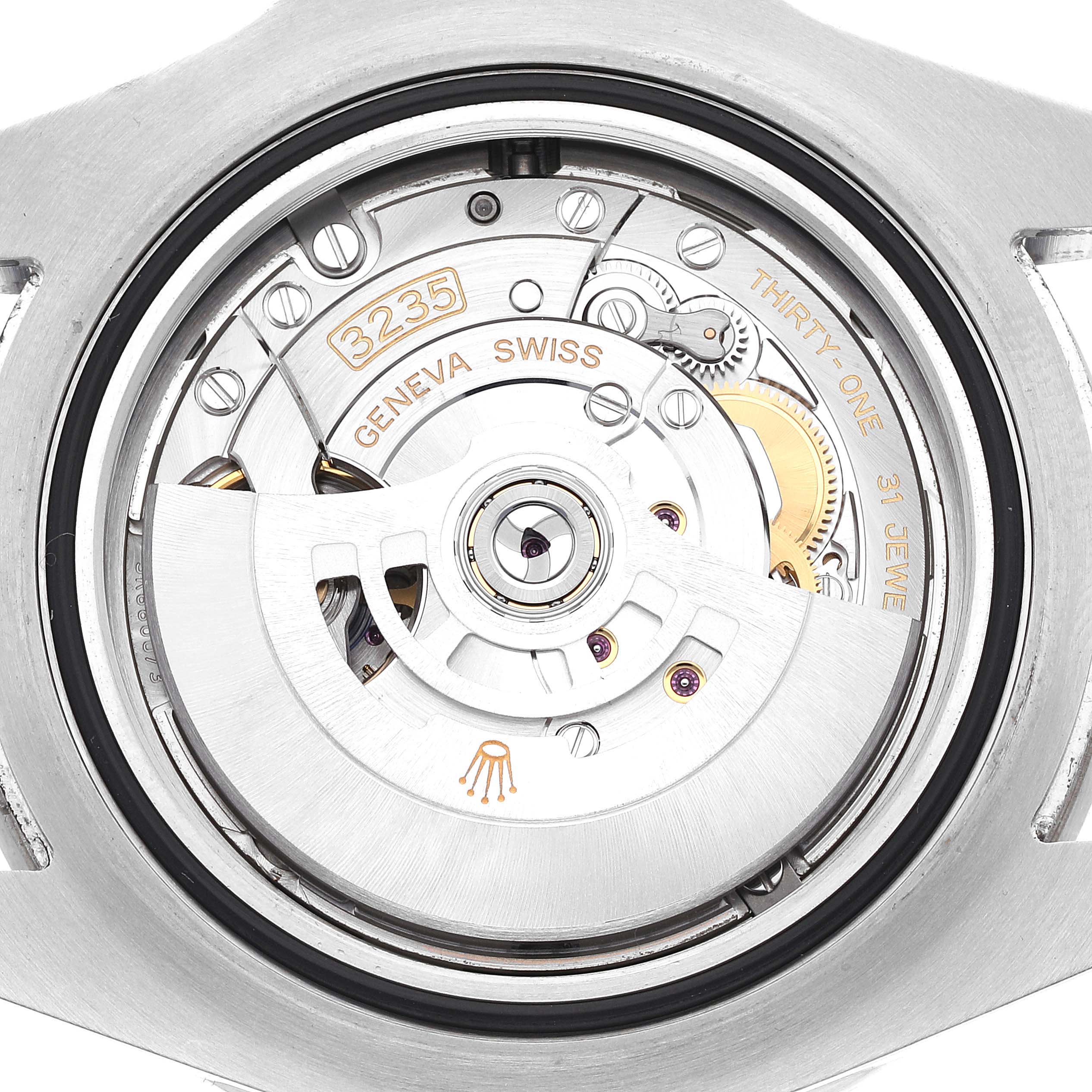 This is a close-up image showing the movement mechanism of a Rolex Sea-Dweller 126600 Men's Stainless Steel Black Dial 126600 Men's Stainless Steel Black Dial watch, highlighting the intricate components.