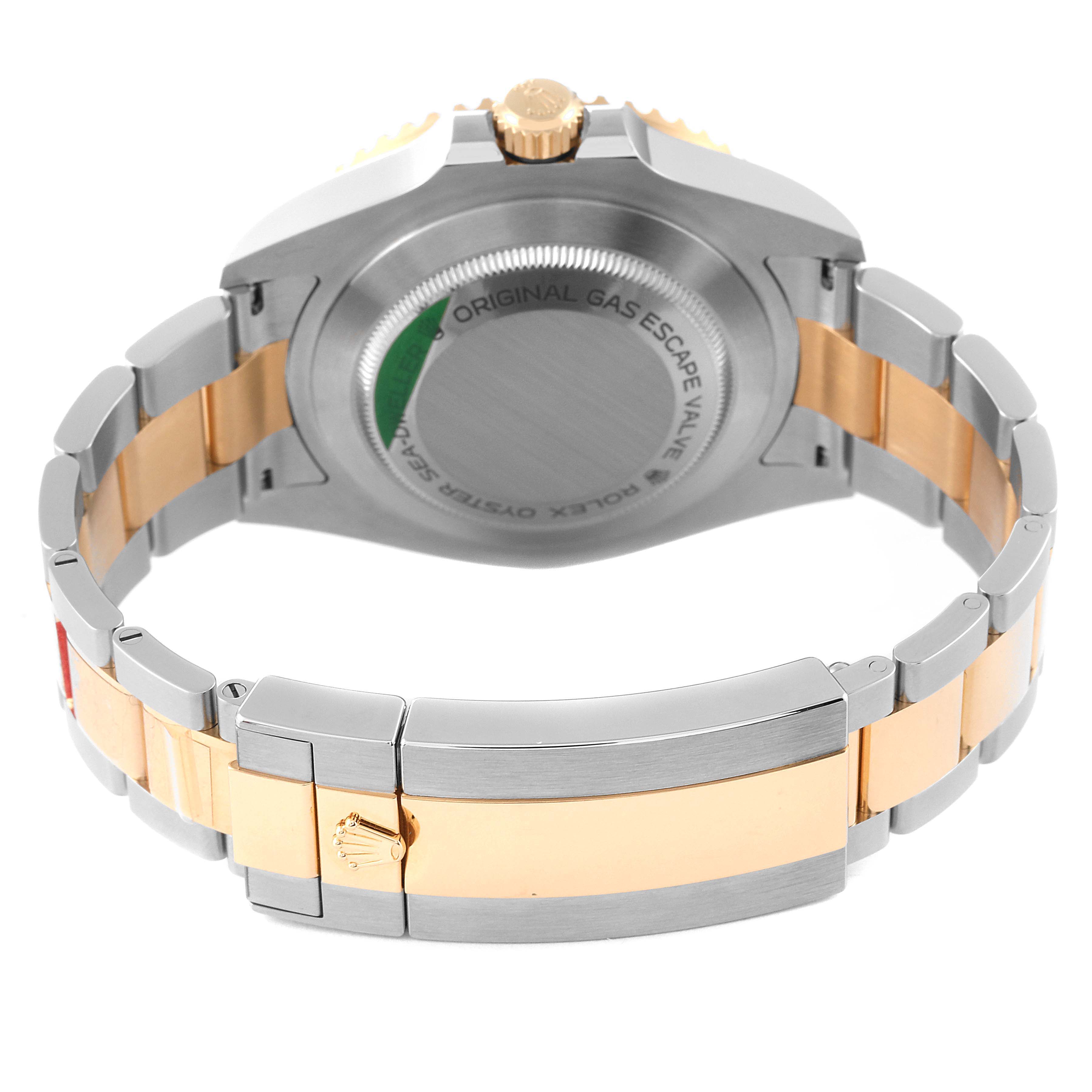 This image shows the back case and bracelet of a Rolex Sea-Dweller 126603 Men's Steel and Gold (two tone) Black Dial 126603 Men's Steel and Gold (two tone) Black Dial watch, focusing on its clasp and metal finish.