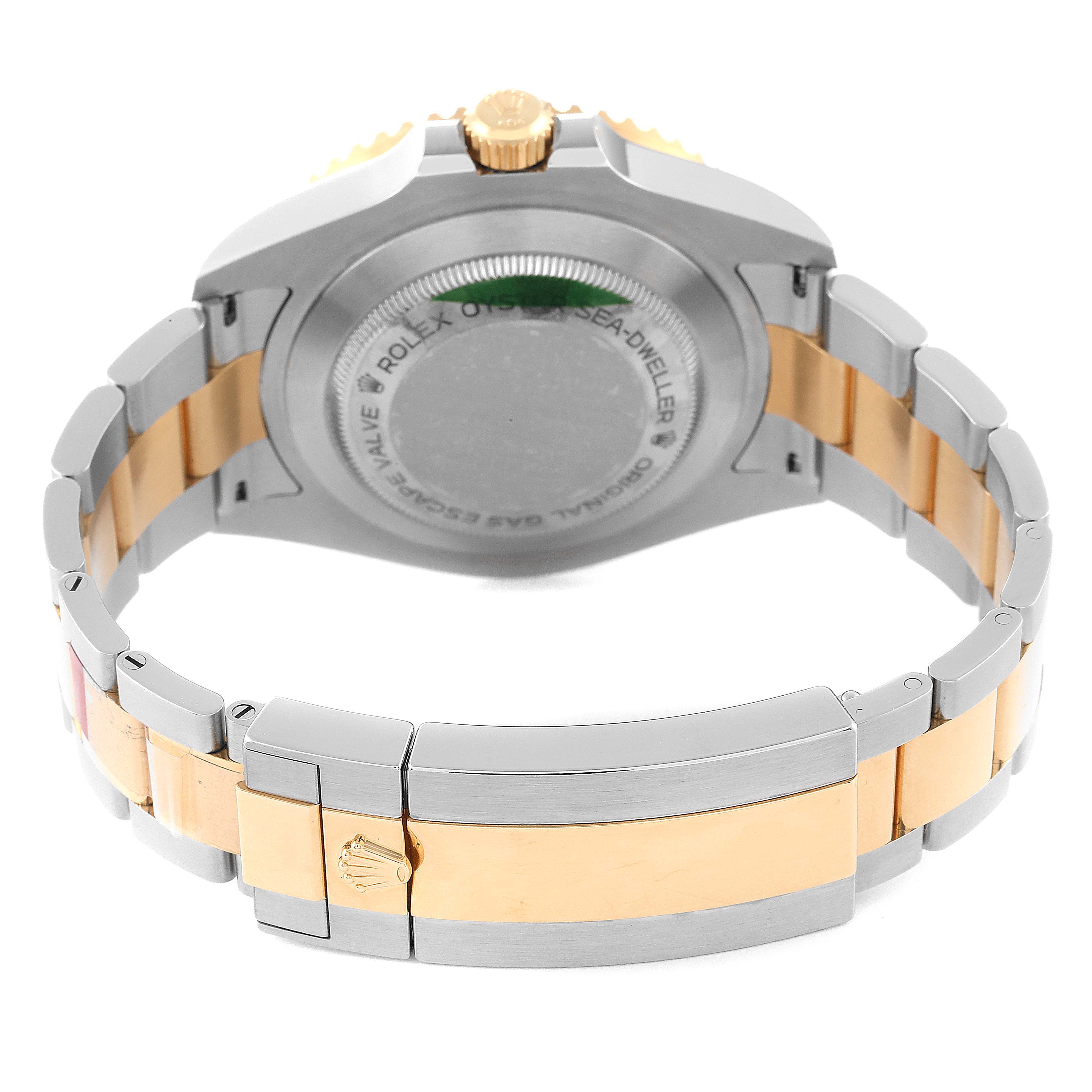 The image shows the back case and bracelet of the Rolex Sea-Dweller 126603 Men's Steel and Gold (two tone) Black Dial 126603 Men's Steel and Gold (two tone) Black Dial watch in a combination of steel and gold.