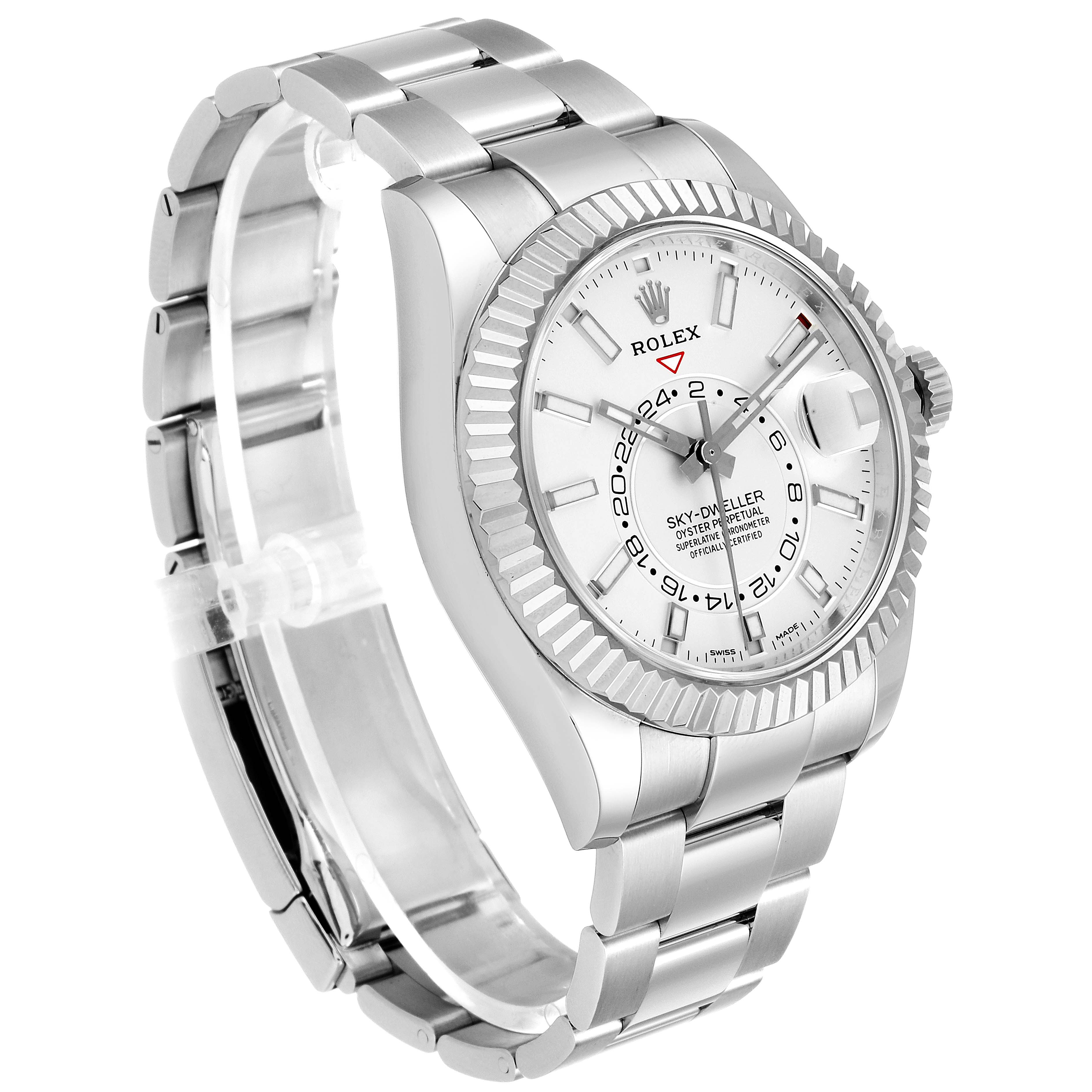 The Rolex Sky-Dweller 326934 Men's Stainless Steel White Dial 326934 Men's Stainless Steel White Dial watch is shown at a three-quarter angle, highlighting its dial, bezel, and band.