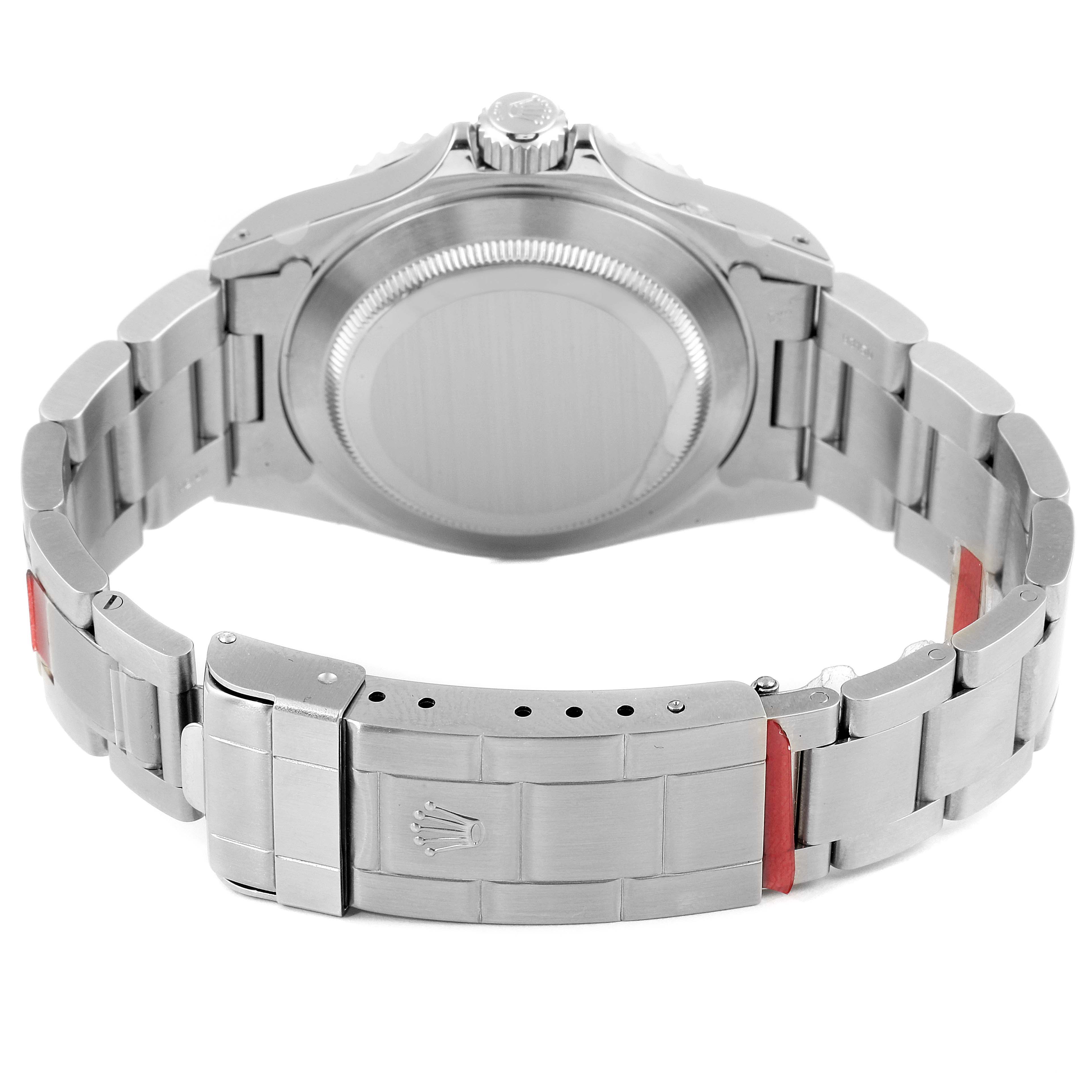 The image shows the back of a Rolex Submariner 14060M Men's Stainless Steel Black Dial 14060M Men's Stainless Steel Black Dial watch, focusing on the case back and stainless steel bracelet.