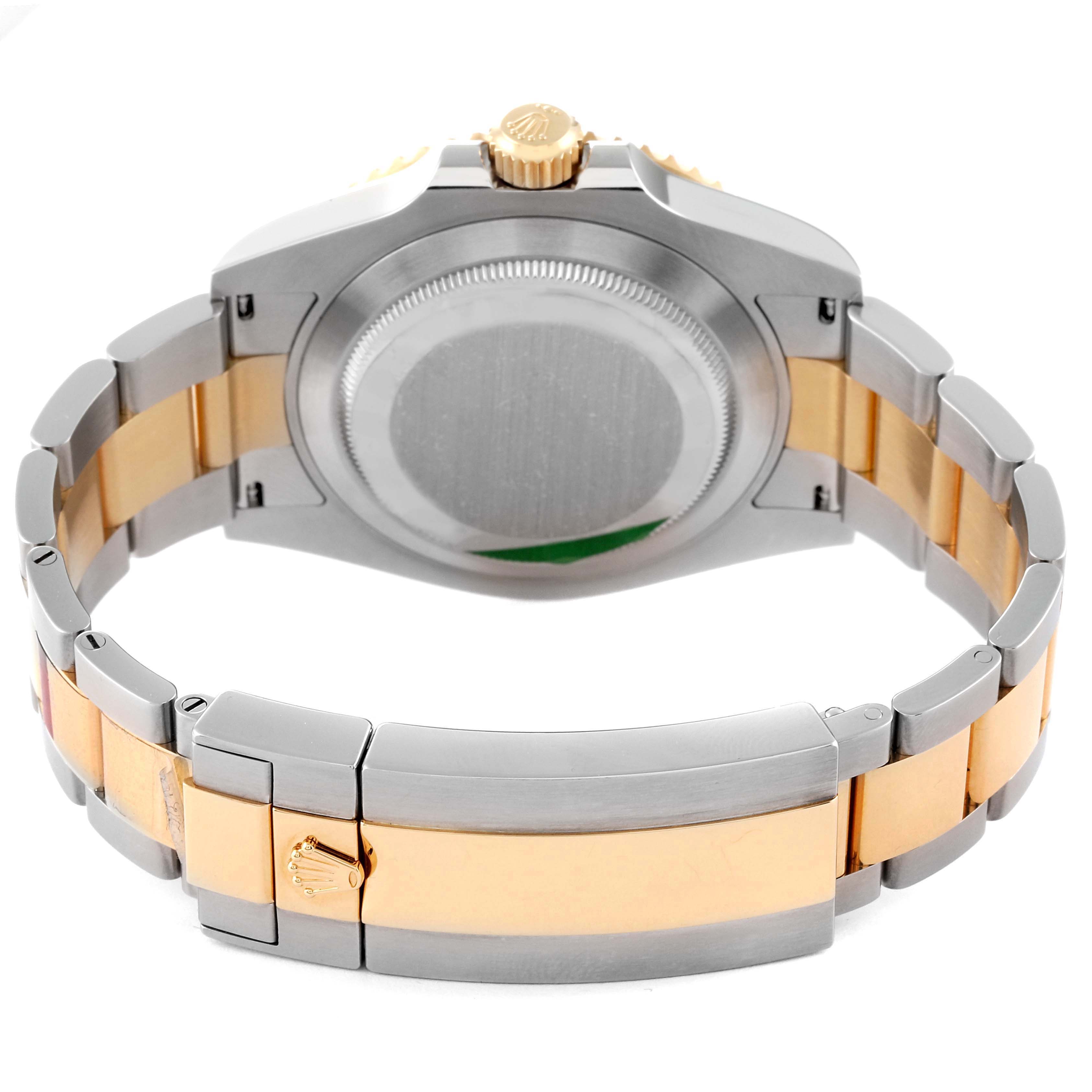 This image shows the backside and bracelet of a Rolex Submariner 126613 Men's Steel and Gold (two tone) Blue Dial 126613 Men's Steel and Gold (two tone) Blue Dial watch, highlighting the clasp and case back.