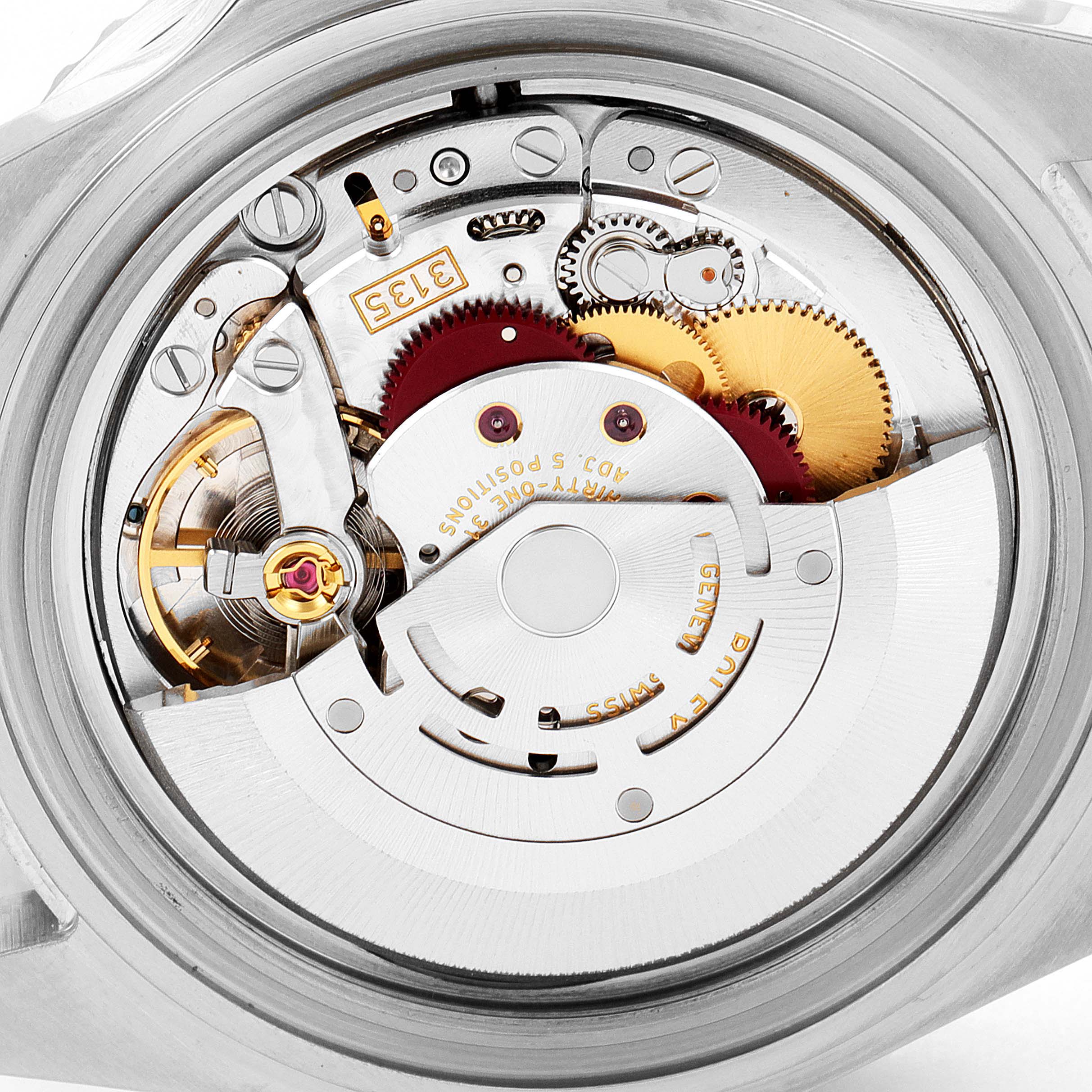 This image shows the internal mechanism of a Rolex Submariner 16610 Men
s Stainless Steel Black Dial 16610 Men
s Stainless Steel Black Dial watch from a close-up, rear angle.