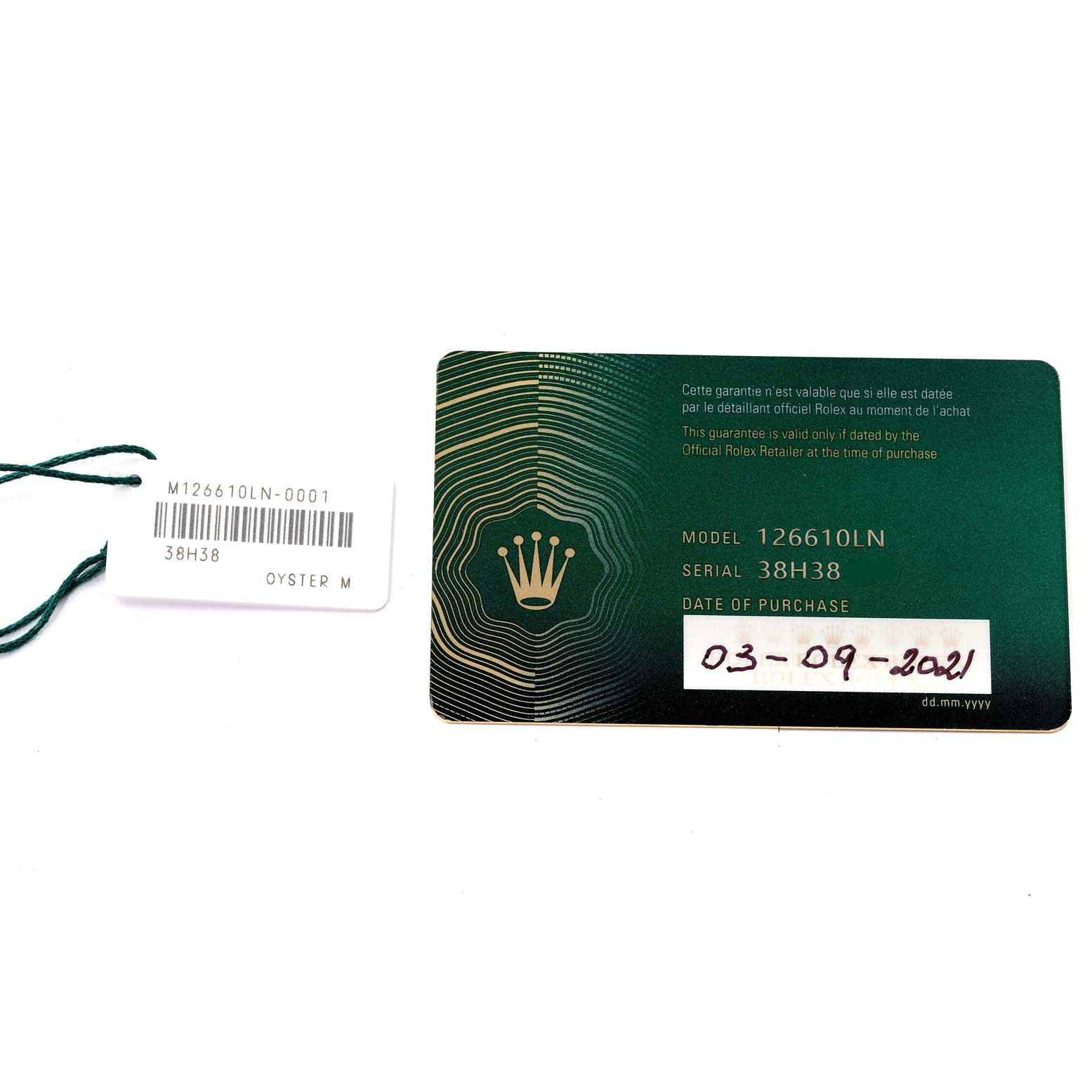 The image shows a warranty card and a tag for a Rolex Submariner 126610 Men's Stainless Steel Black Dial 126610 Men's Stainless Steel Black Dial model (126610LN) with serial number 38H38.