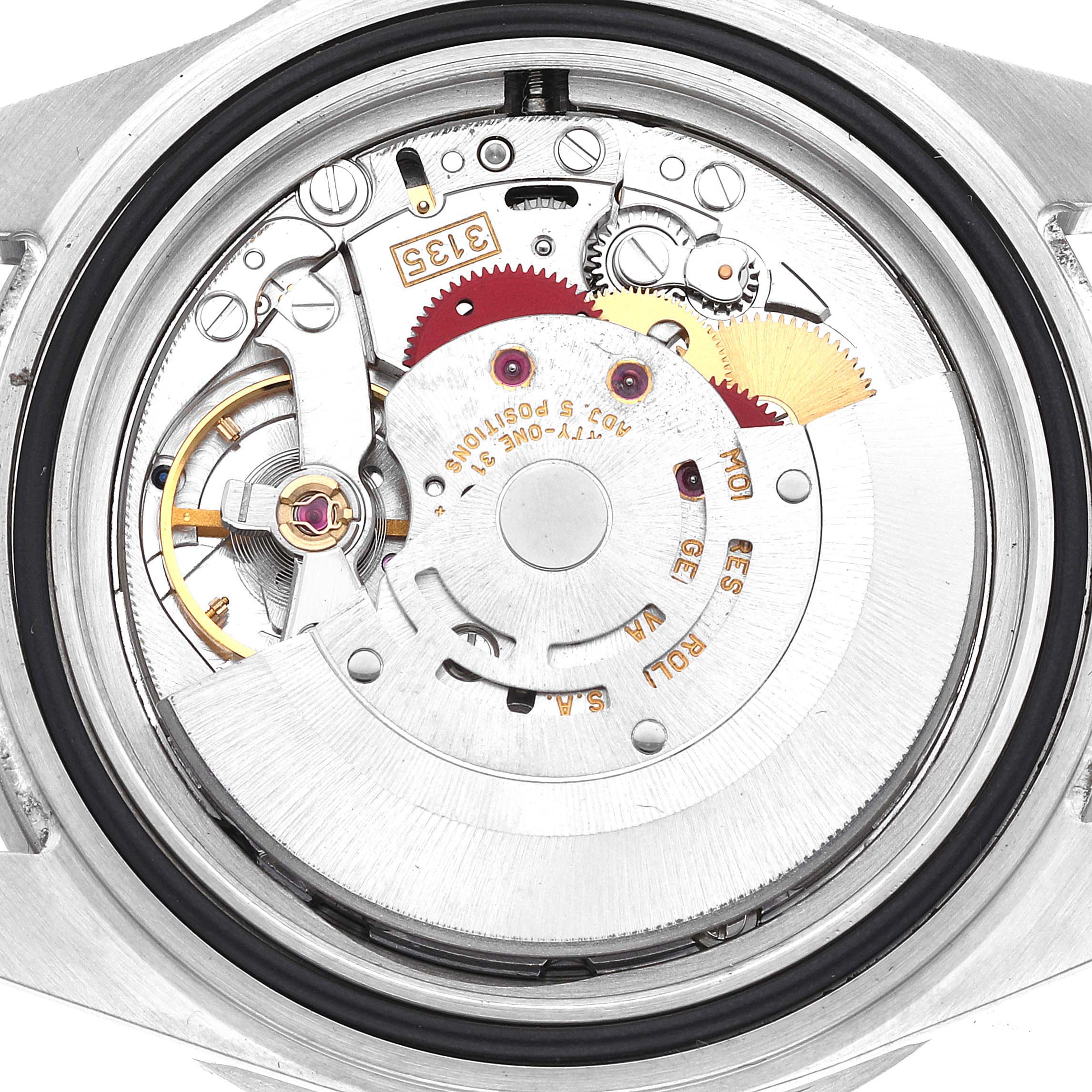 This image shows a close-up view of the movement mechanism inside a Rolex Submariner 16610 Men
s Stainless Steel Black Dial 16610 Men
s Stainless Steel Black Dial watch with the case back removed.