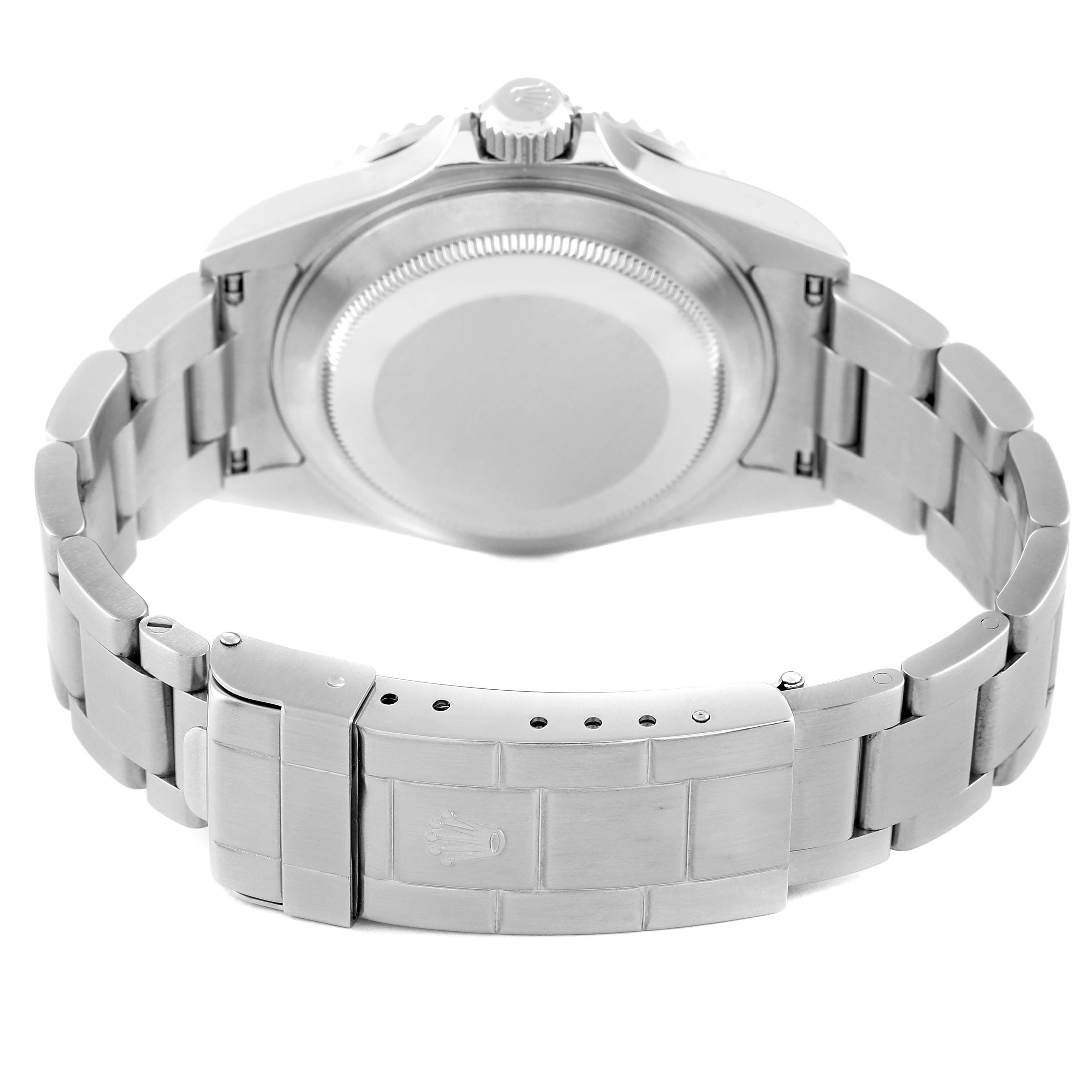 The image shows the back view of a Rolex Submariner 16610 Men's Stainless Steel Black Dial 16610 Men's Stainless Steel Black Dial watch, highlighting its case, clasp, and bracelet.