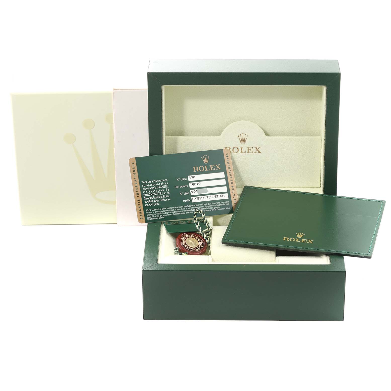 The image shows the box, certification card, tag, and warranty card holder for a Rolex Submariner 16610 Men's Stainless Steel Black Dial 16610 Men's Stainless Steel Black Dial model.