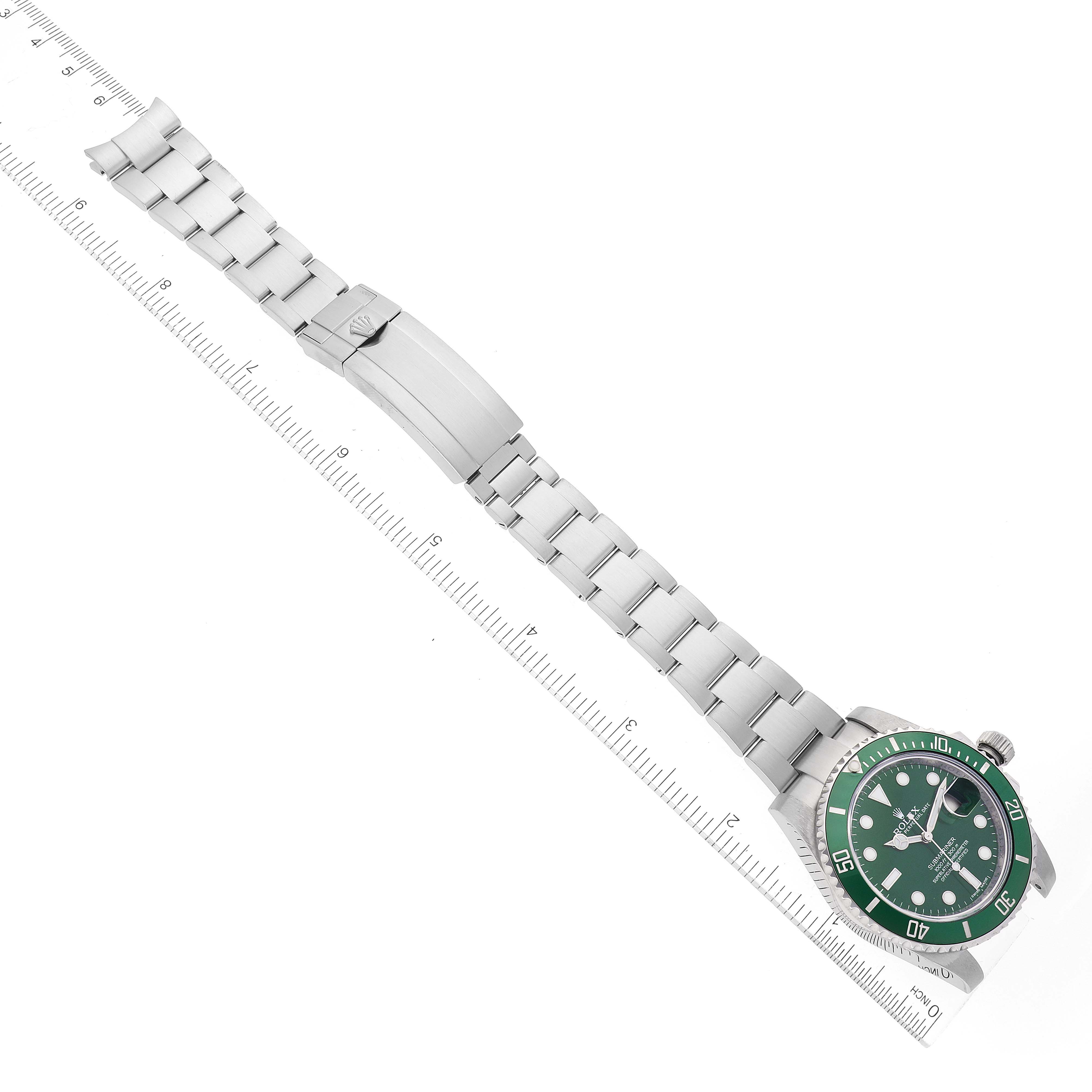 This image shows a top-down view of a Rolex Submariner 116610LV Men's Stainless Steel Green Dial 116610LV Men's Stainless Steel Green Dial watch, highlighting its green bezel, face, and stainless steel bracelet.