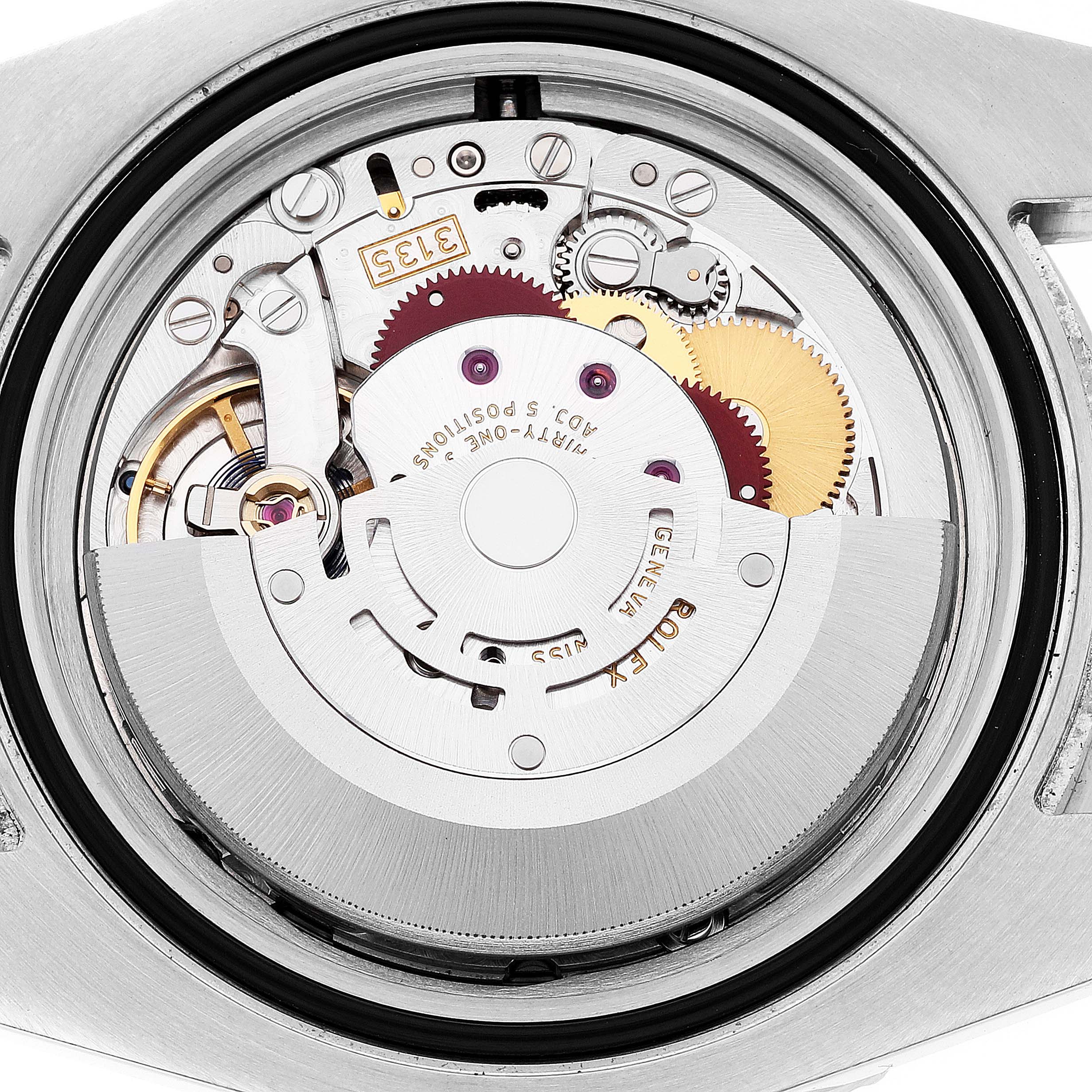 This image shows the internal movement mechanism of the Rolex Submariner 116610LV Men's Stainless Steel Green Dial 116610LV Men's Stainless Steel Green Dial watch from a top-down angle.