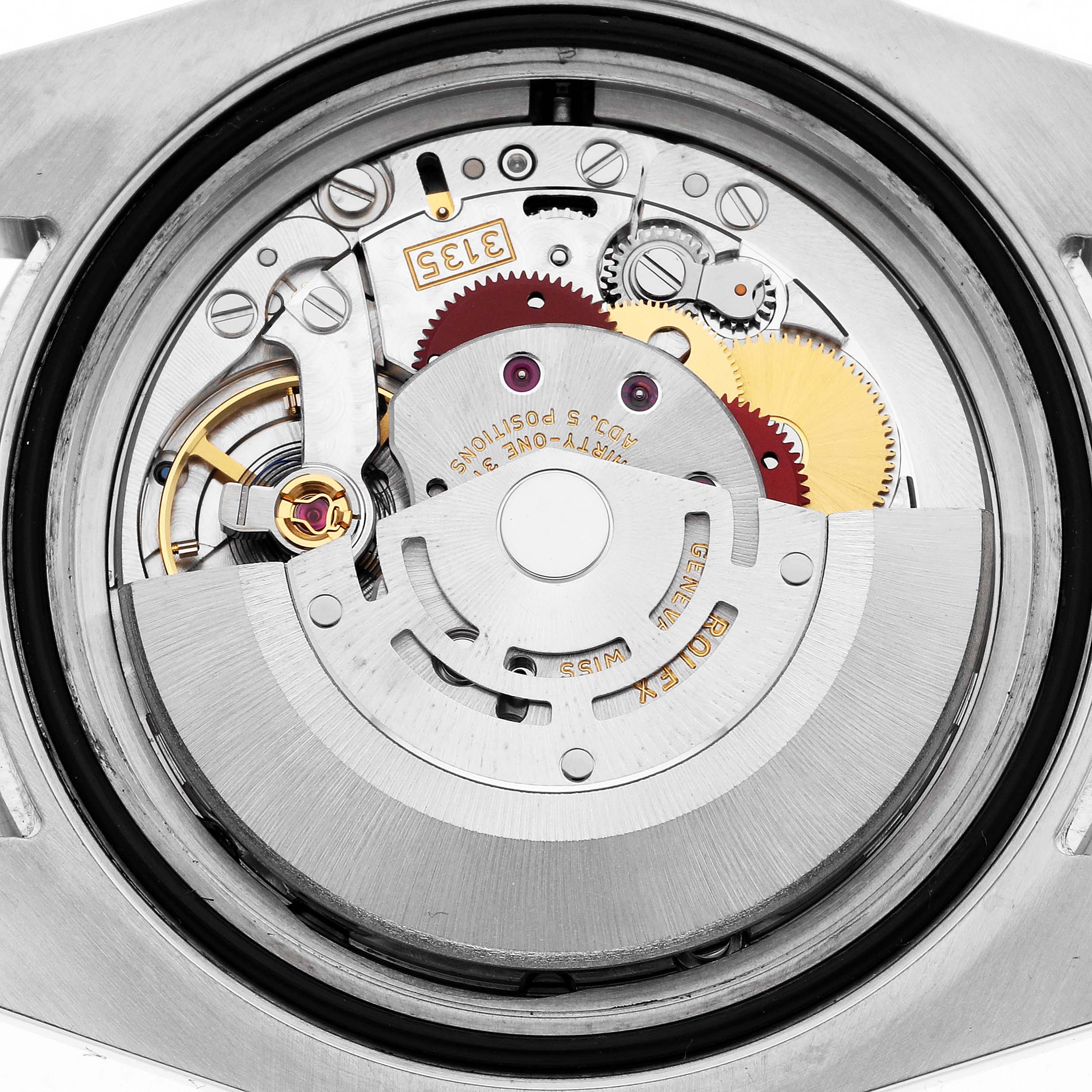 The image shows the movement inside the back of a Rolex Submariner 116610LV Men's Stainless Steel Green Dial 116610LV Men's Stainless Steel Green Dial watch at a close-up angle.