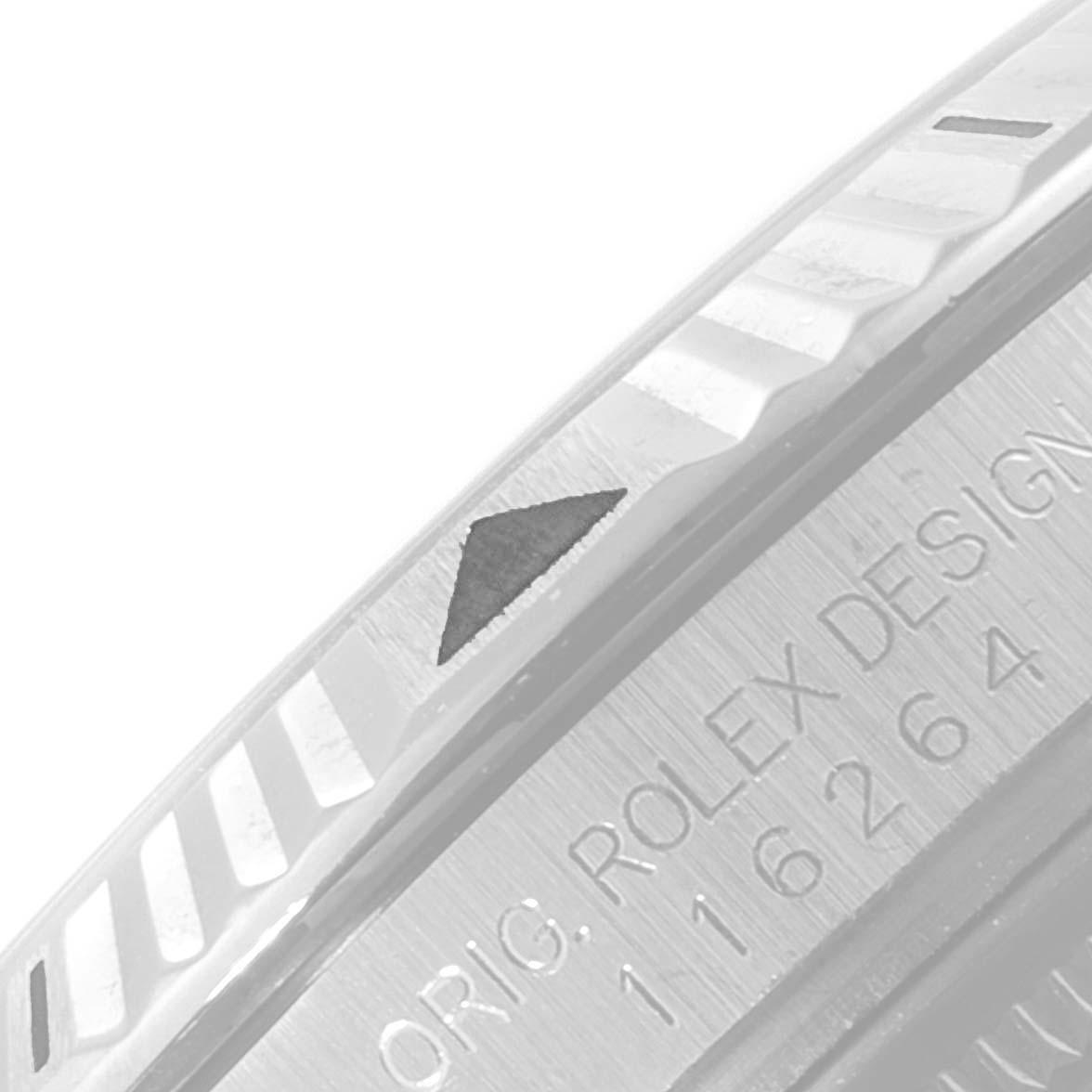 This image shows a close-up of the bezel and part of the caseback engraving of a Rolex Turn-o-Graph 116264 Men
s Stainless Steel White Dial 116264 Men
s Stainless Steel White Dial watch.
