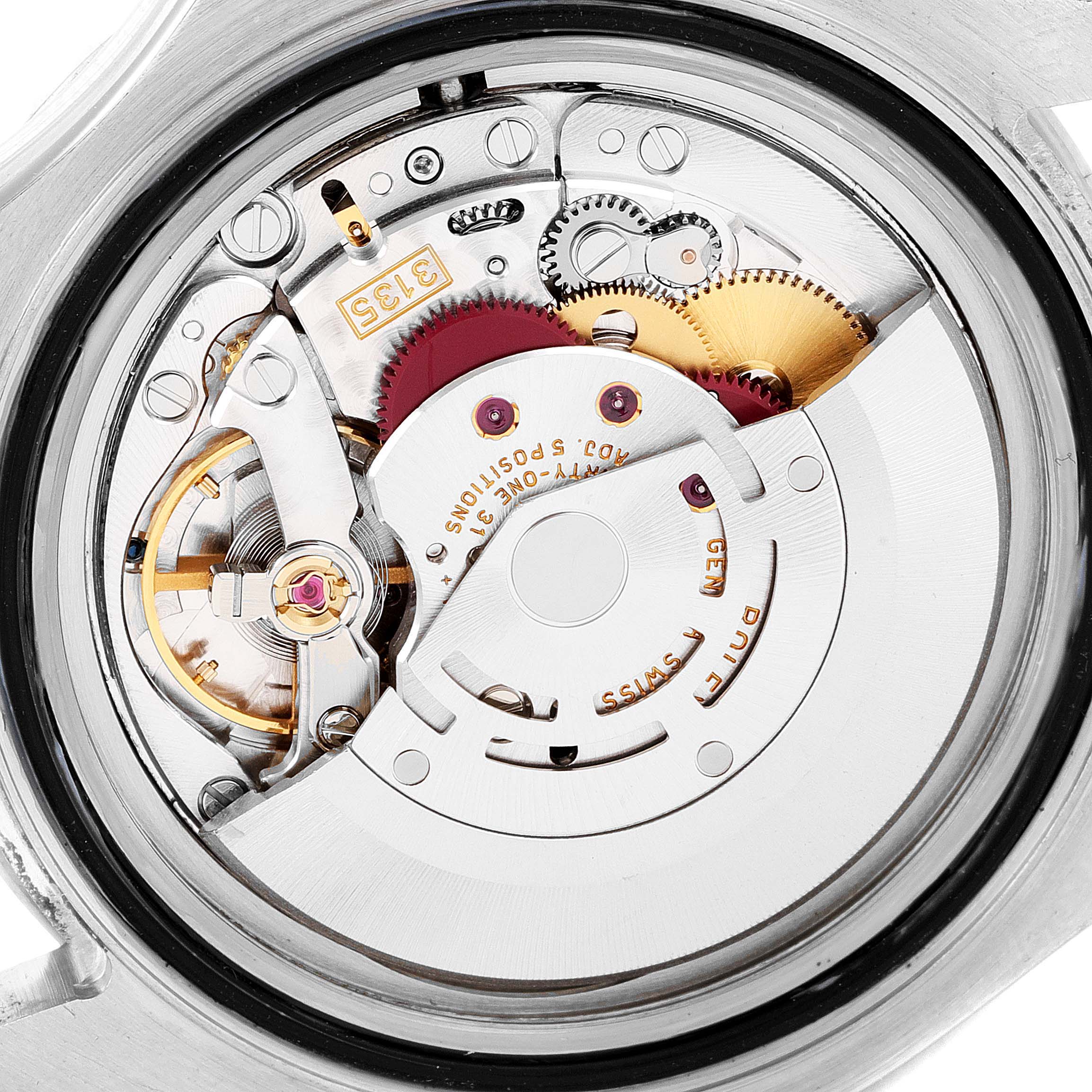 This is a close-up view of the movement mechanism of the Rolex Yacht-Master 16622 Men's Stainless Steel Silver Dial 16622 Men's Stainless Steel Silver Dial watch, showing gears and internal components.