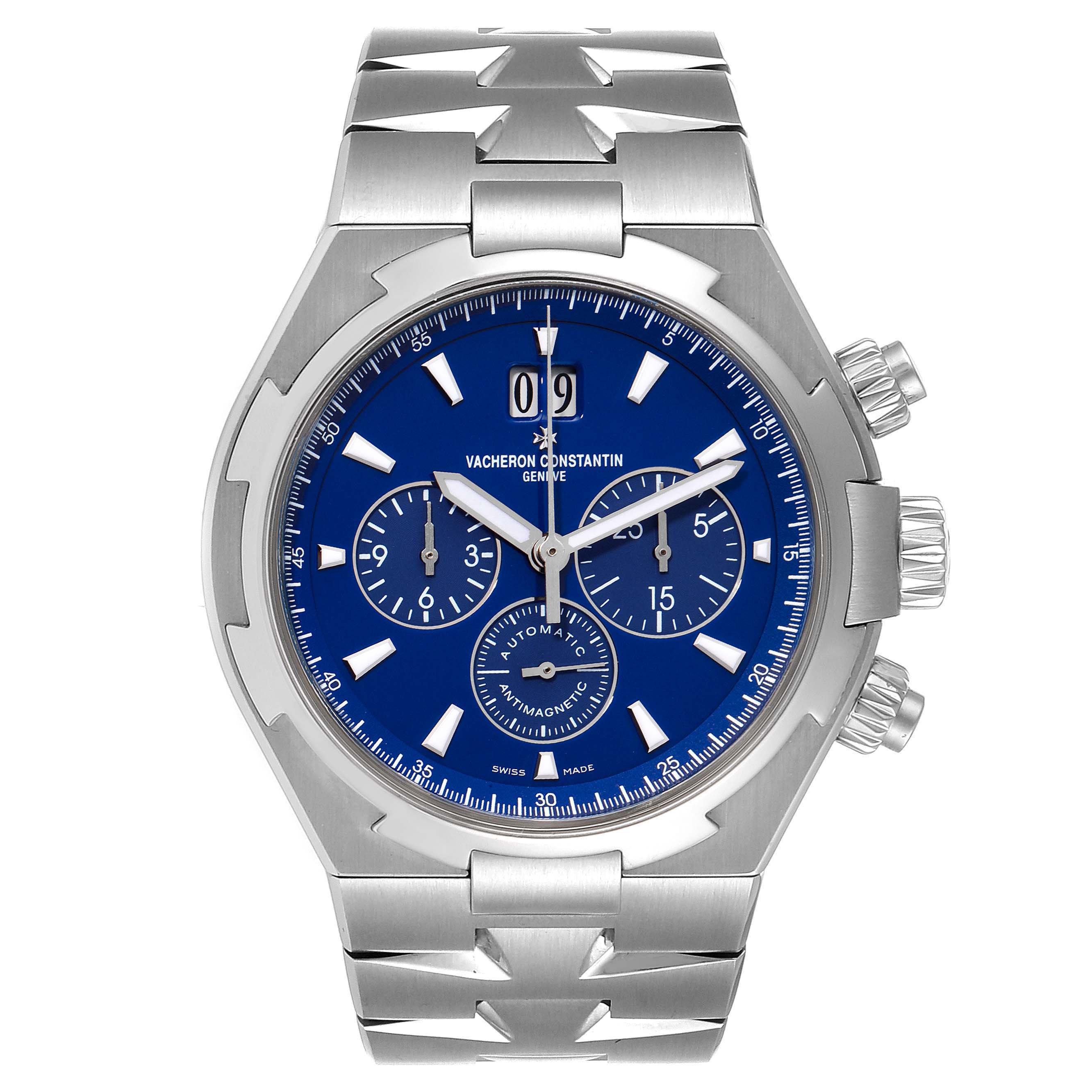 The image shows a frontal view of a Vacheron Constantin Overseas 49150.B01A.9097 Men's Stainless Steel Blue Dial 49150.B01A.9097 Men's Stainless Steel Blue Dial watch, highlighting its blue dial, chronograph sub-dials, and metal bracelet.