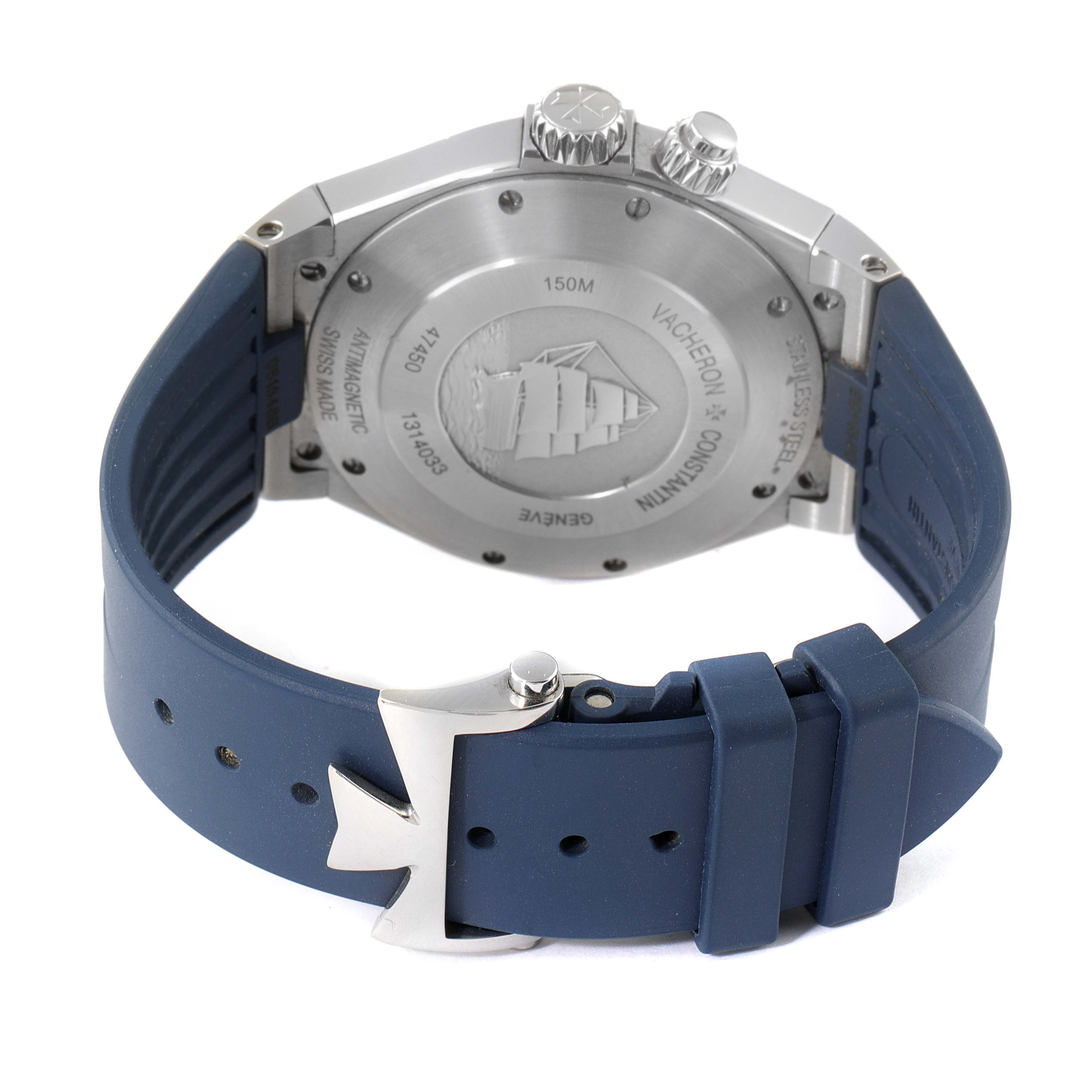 The image shows the back view of a Vacheron Constantin Overseas 47450/000A.9039 Men
s Stainless Steel Blue Dial 47450/000A.9039 Men
s Stainless Steel Blue Dial model watch, highlighting the case back, crown, and blue rubber strap.