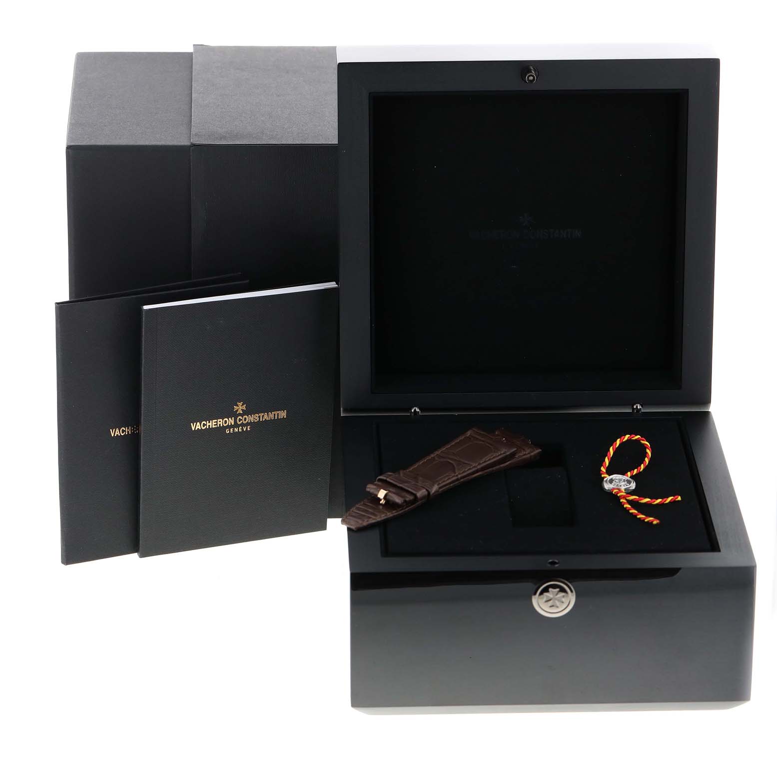 The Vacheron Constantin Overseas 7900V/000R-B336 Men's Rose Gold Silver Dial 7900V/000R-B336 Men's Rose Gold Silver Dial model accessories include a dark watch box, an extra strap, and booklets, all shown from a front angle.