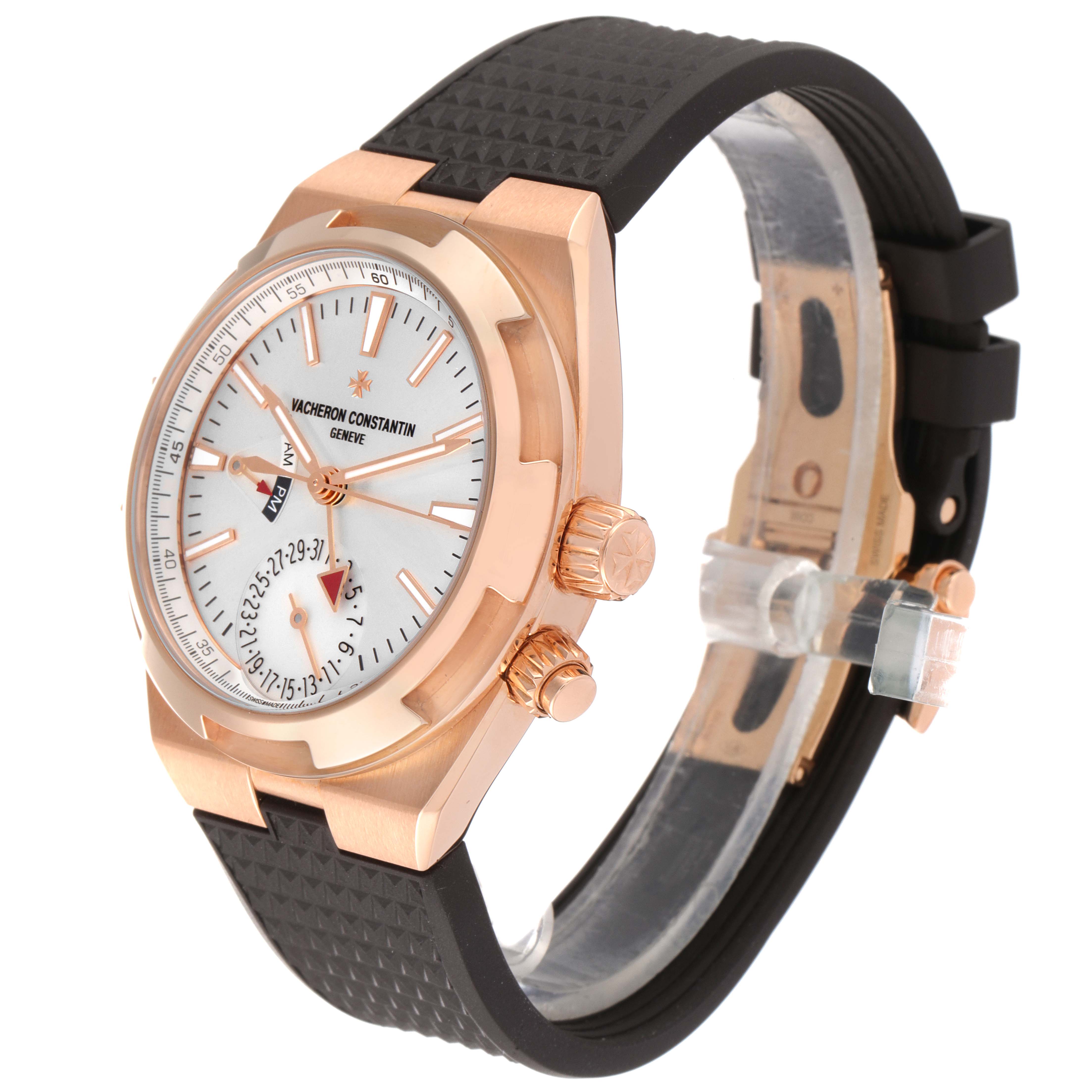 The image shows an angled view of a Vacheron Constantin Overseas 7900V/000R-B336 Men's Rose Gold Silver Dial 7900V/000R-B336 Men's Rose Gold Silver Dial watch, featuring the face, bezel, crown, and part of the strap.