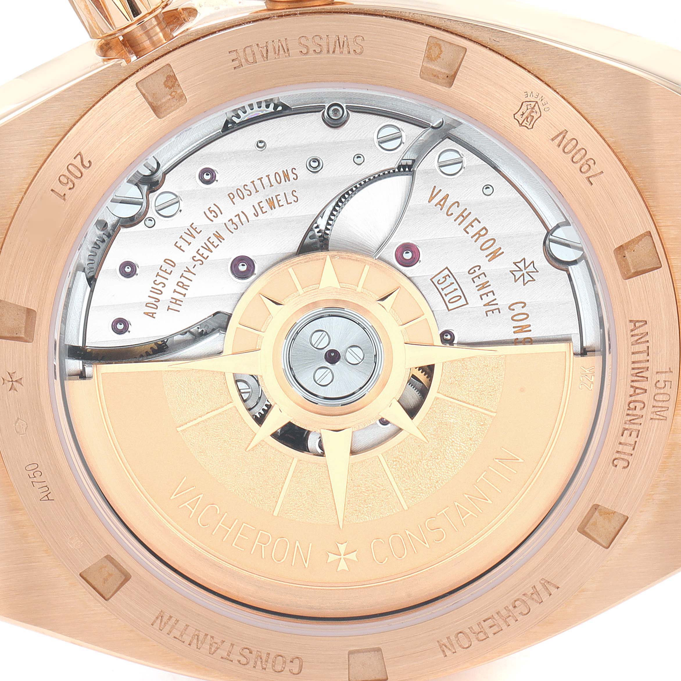 The image shows the back view of a Vacheron Constantin Overseas 7900V/000R-B336 Men's Rose Gold Silver Dial 7900V/000R-B336 Men's Rose Gold Silver Dial watch, highlighting its movement and internal mechanisms.