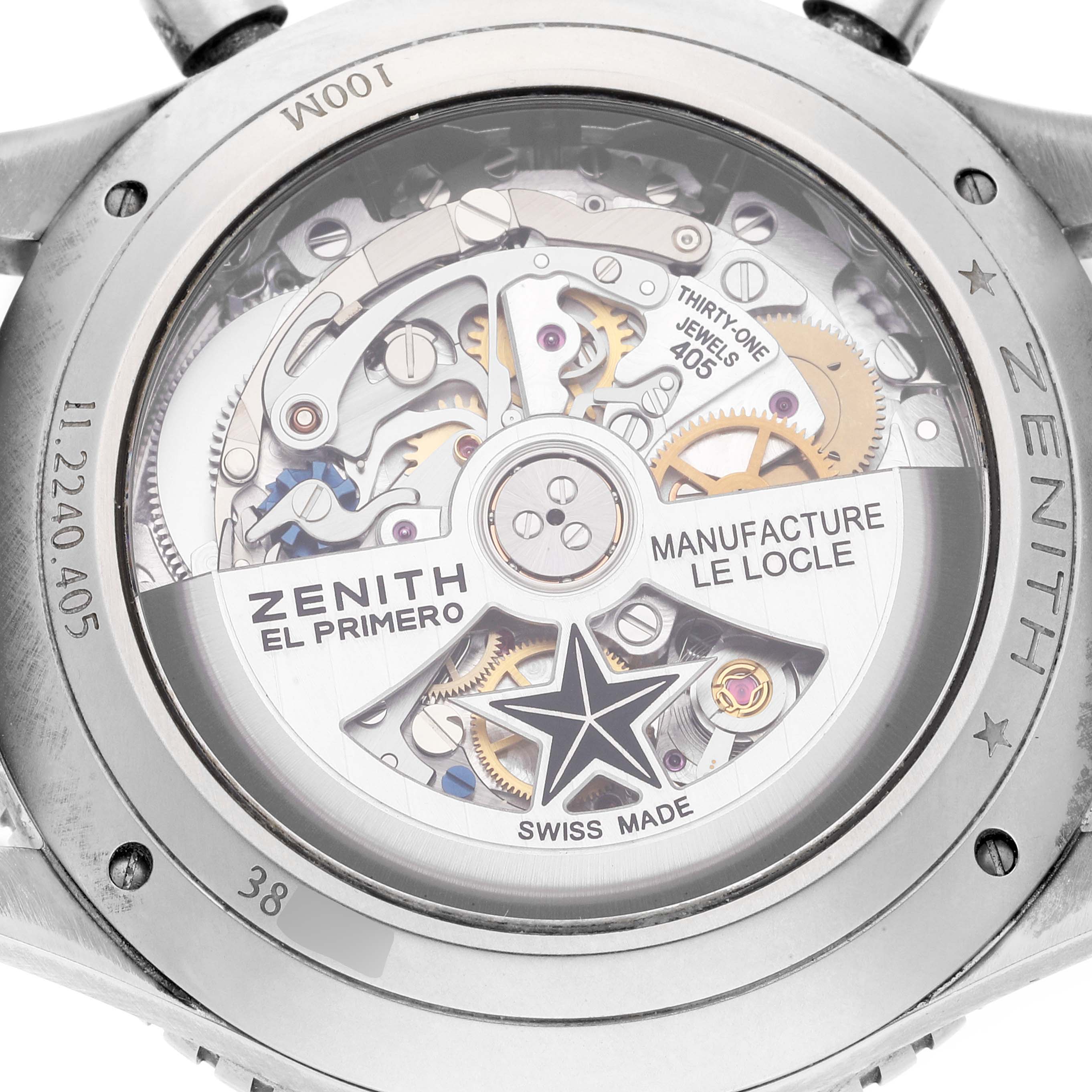 The image shows the back side of a Zenith El Primero Pilot model watch, revealing its intricate movement mechanism.