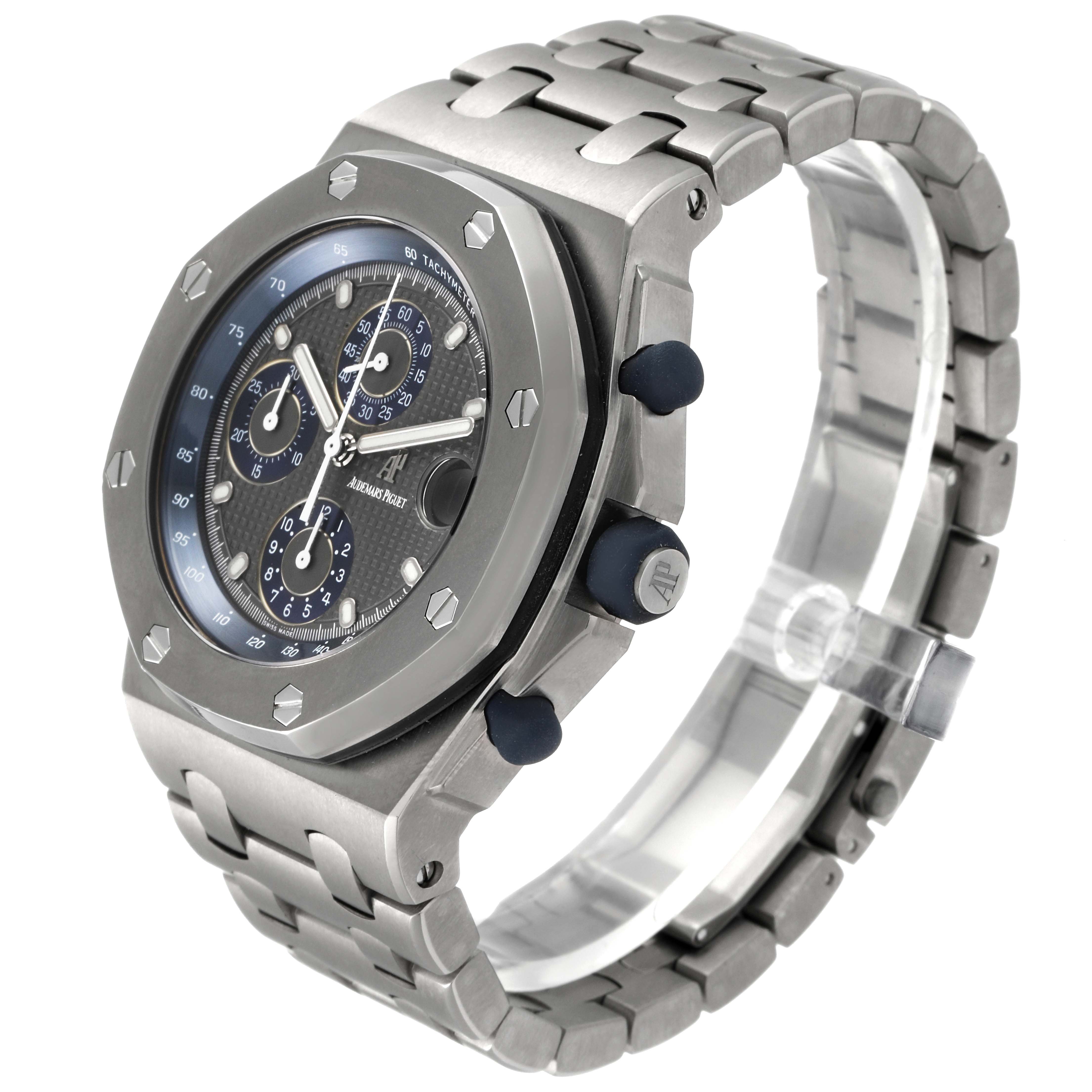 The image shows a side angle of the Audemars Piguet Royal Oak Offshore 25721TI  Men's Titanium Grey Dial 25721TI  Men's Titanium Grey Dial watch, highlighting the case, bezel, bracelet, and pushers.