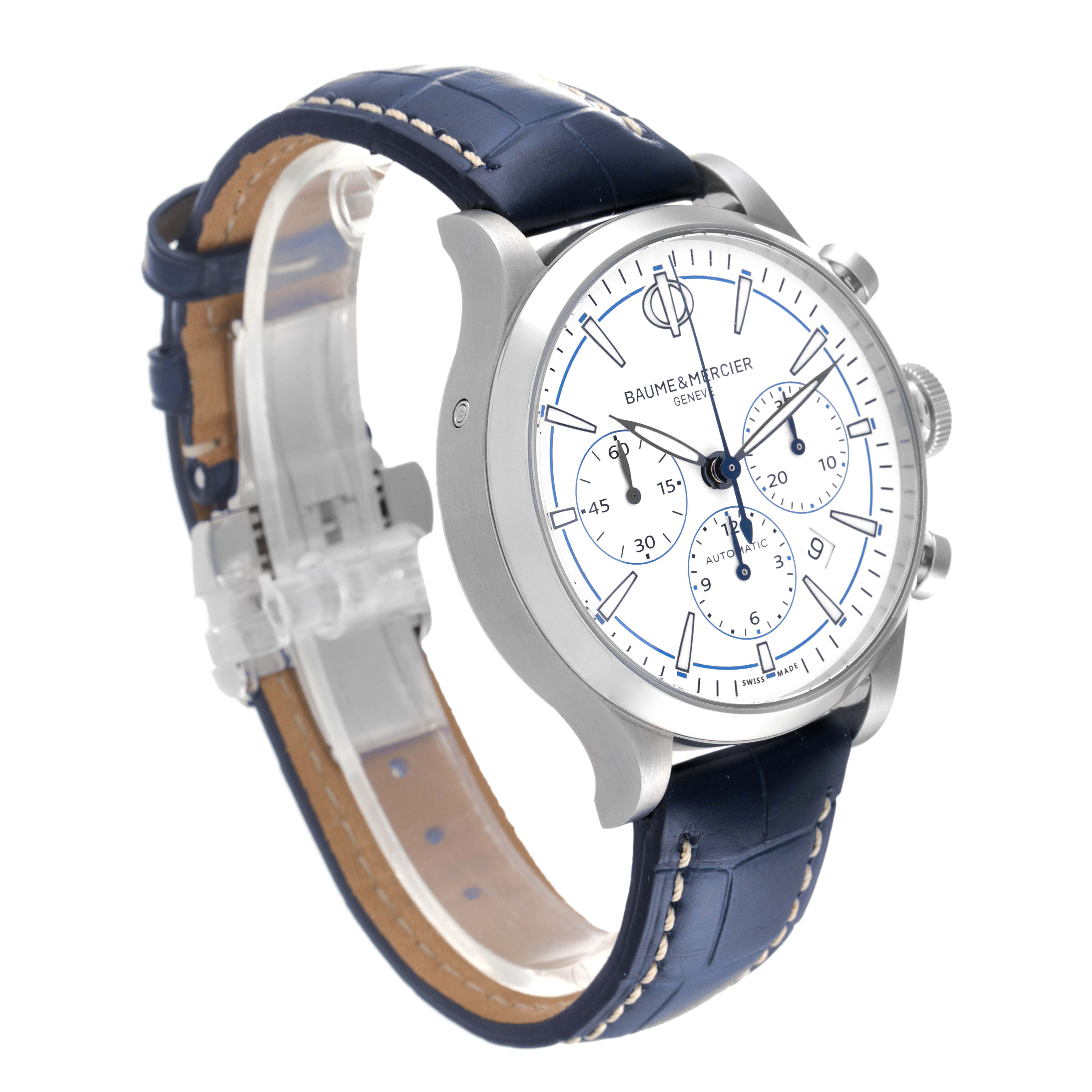 The Baume & Mercier Capeland MOA10437 Men's Stainless Steel White Dial MOA10437 Men's Stainless Steel White Dial watch is shown at a three-quarter angle, displaying the face, side buttons, and leather strap.