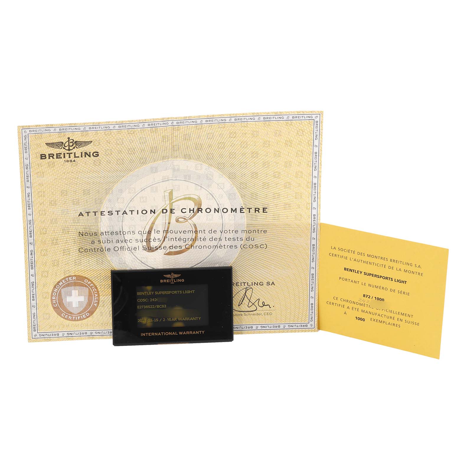 This image shows the certification papers and warranty card for a Breitling Bentley E2736522/BC63 Men's Titanium Black Dial E2736522/BC63 Men's Titanium Black Dial model watch.