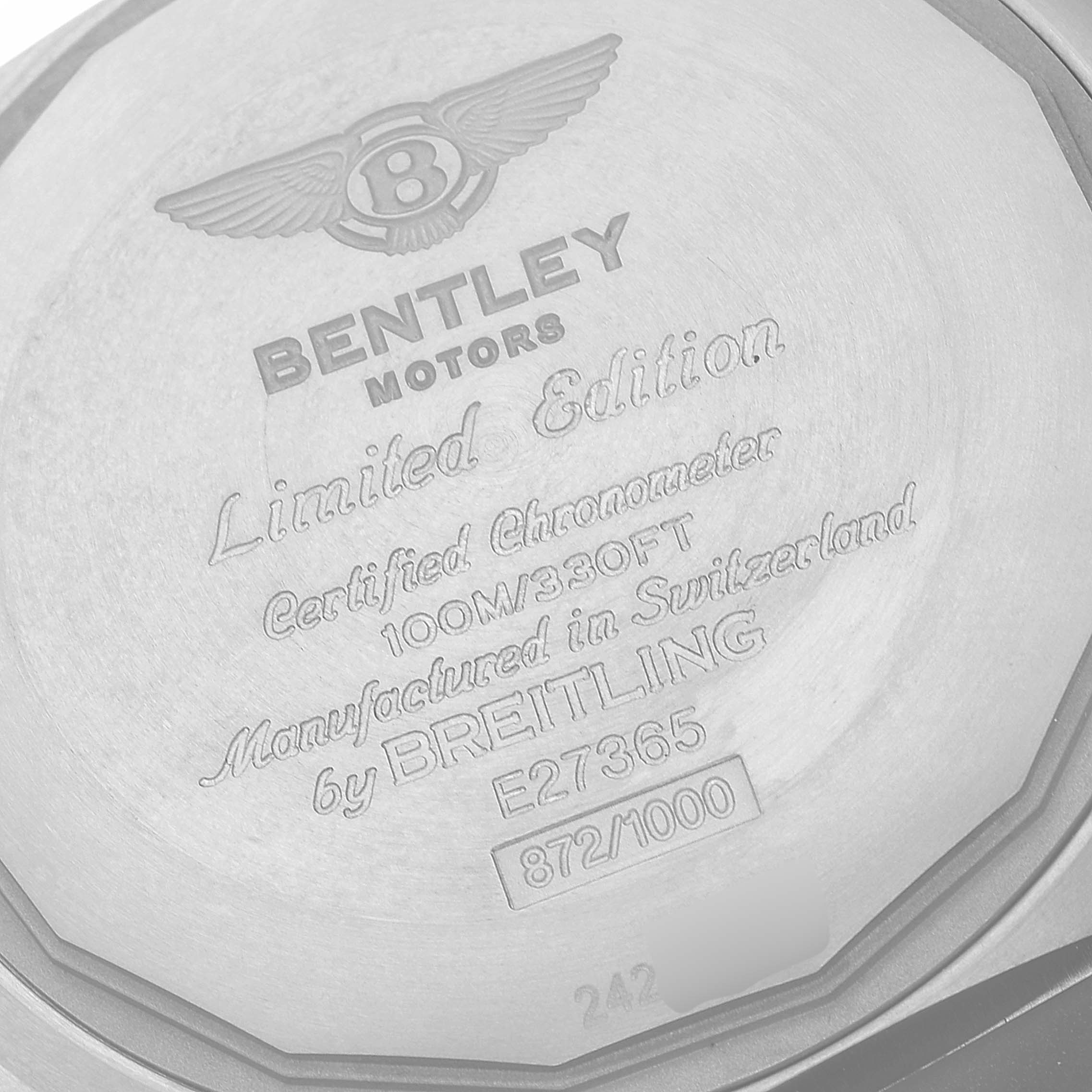 The image shows the back casing of a Bentley model watch by Breitling, displaying engraved details and limited edition information.