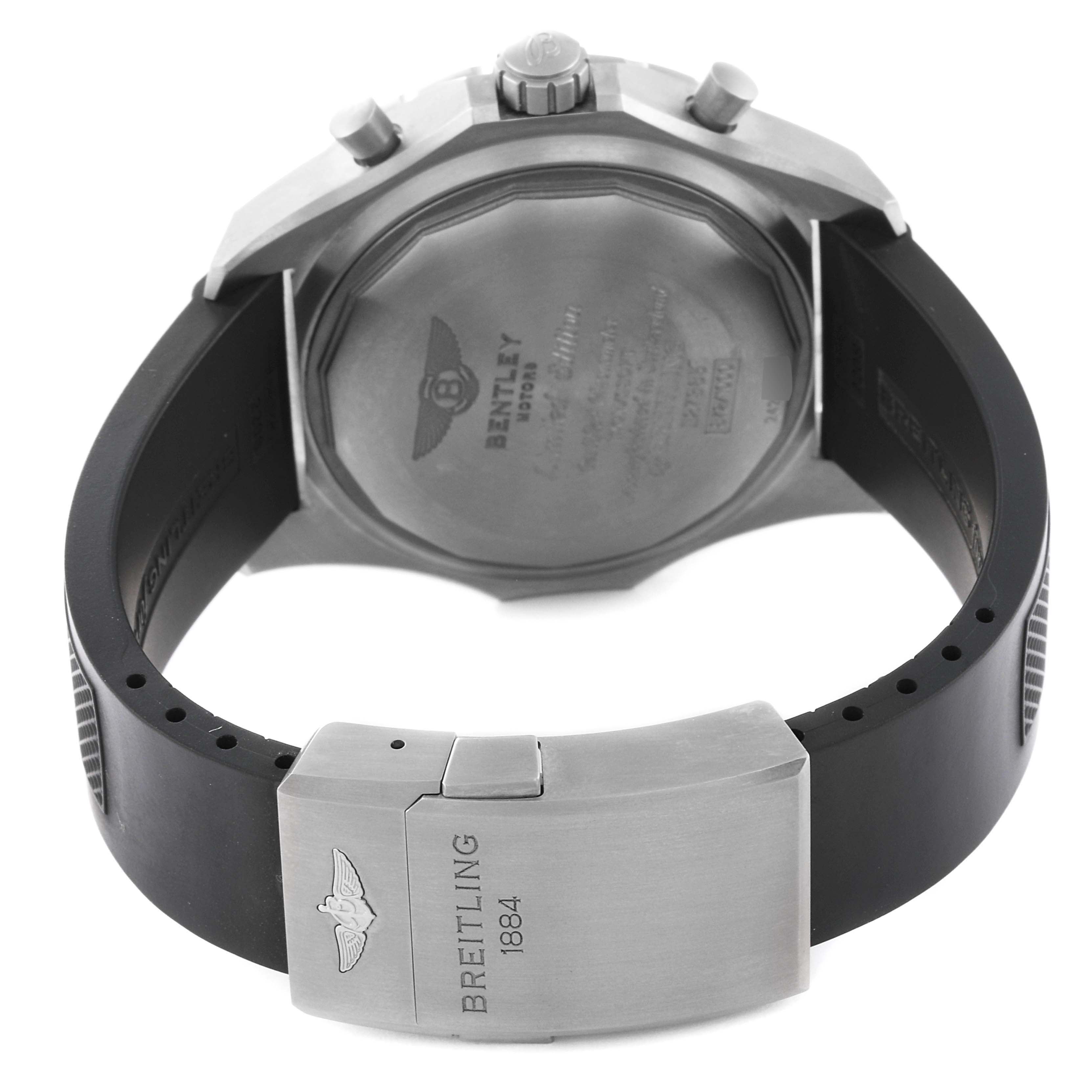 The image shows the back view of a Bentley model by Breitling, highlighting the case back and part of the black strap with the clasp.