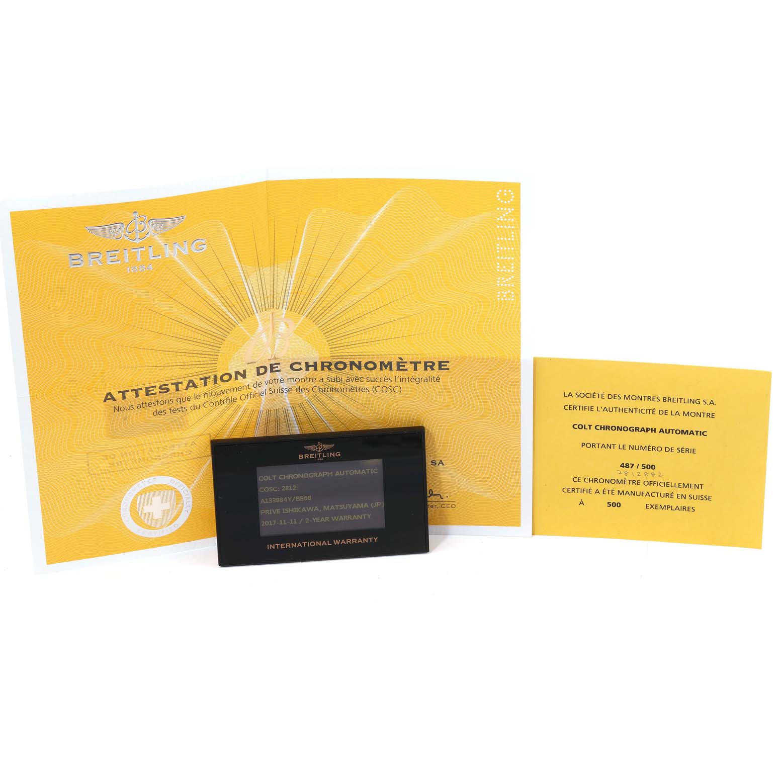 The image shows the warranty card and certification documents for the Breitling Limited Series Colt Chronograph Automatic watch.