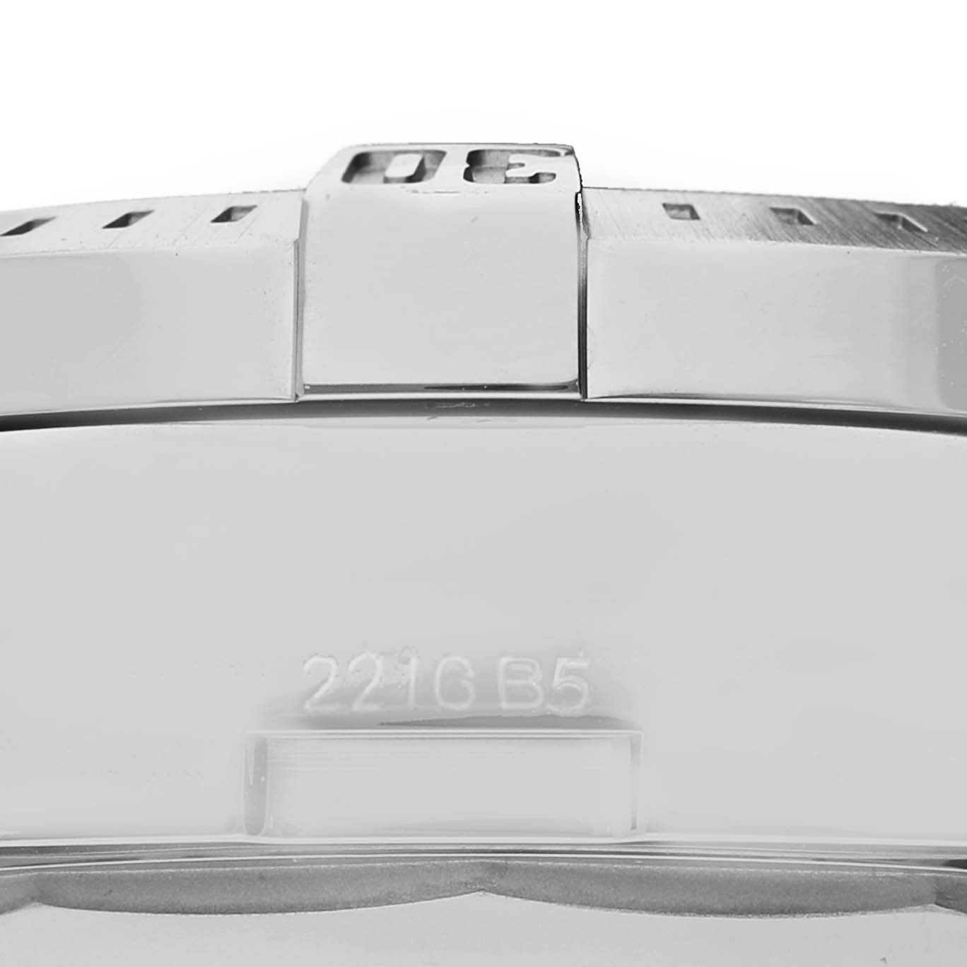 This close-up image of the Breitling Limited Series watch shows the side view of the bezel with the serial number 2216 B5.