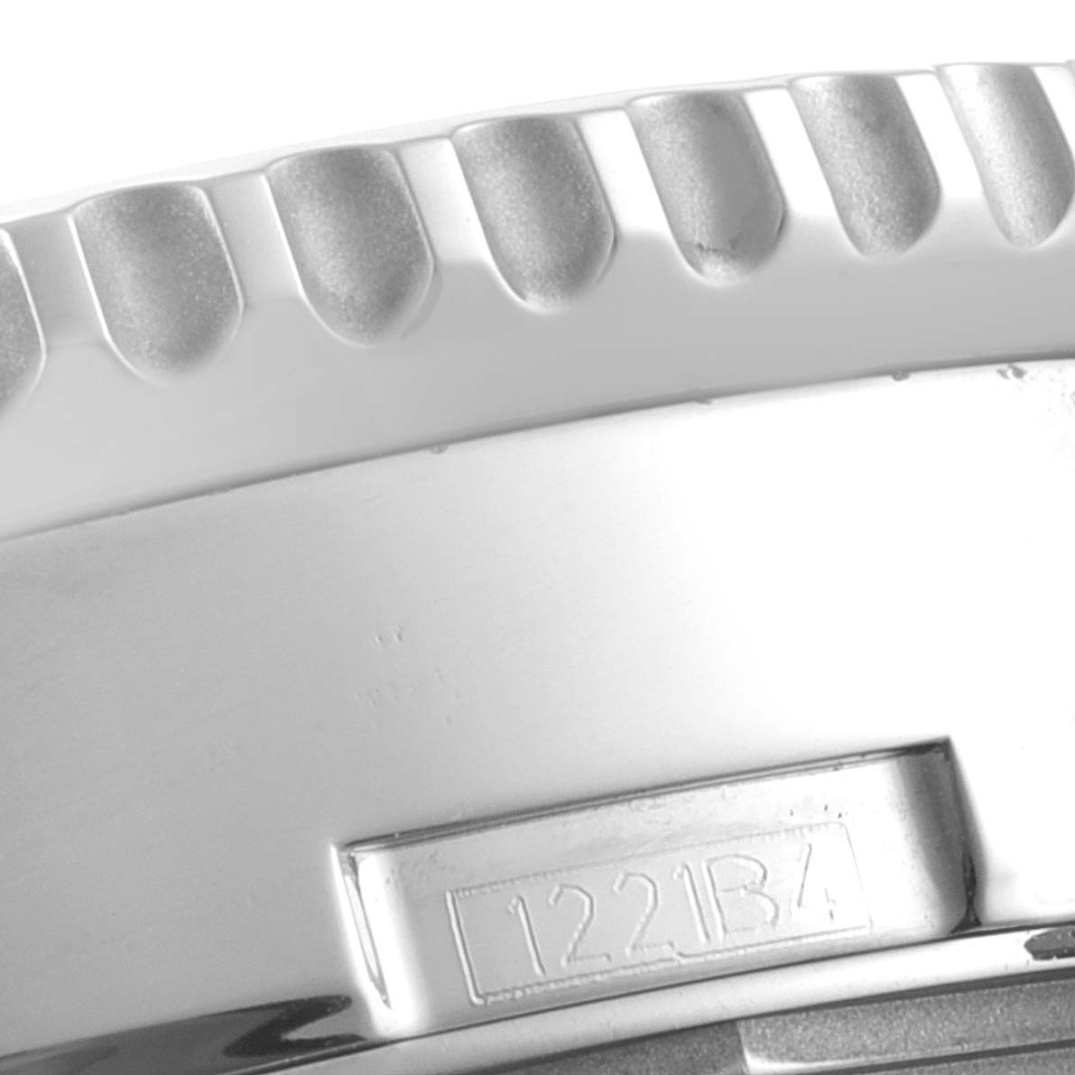 The image shows a close-up of the bezel and the side case with a model number of the Breitling Navitimer AB0127211C1A1 Men's Stainless Steel Blue Dial AB0127211C1A1 Men's Stainless Steel Blue Dial watch.