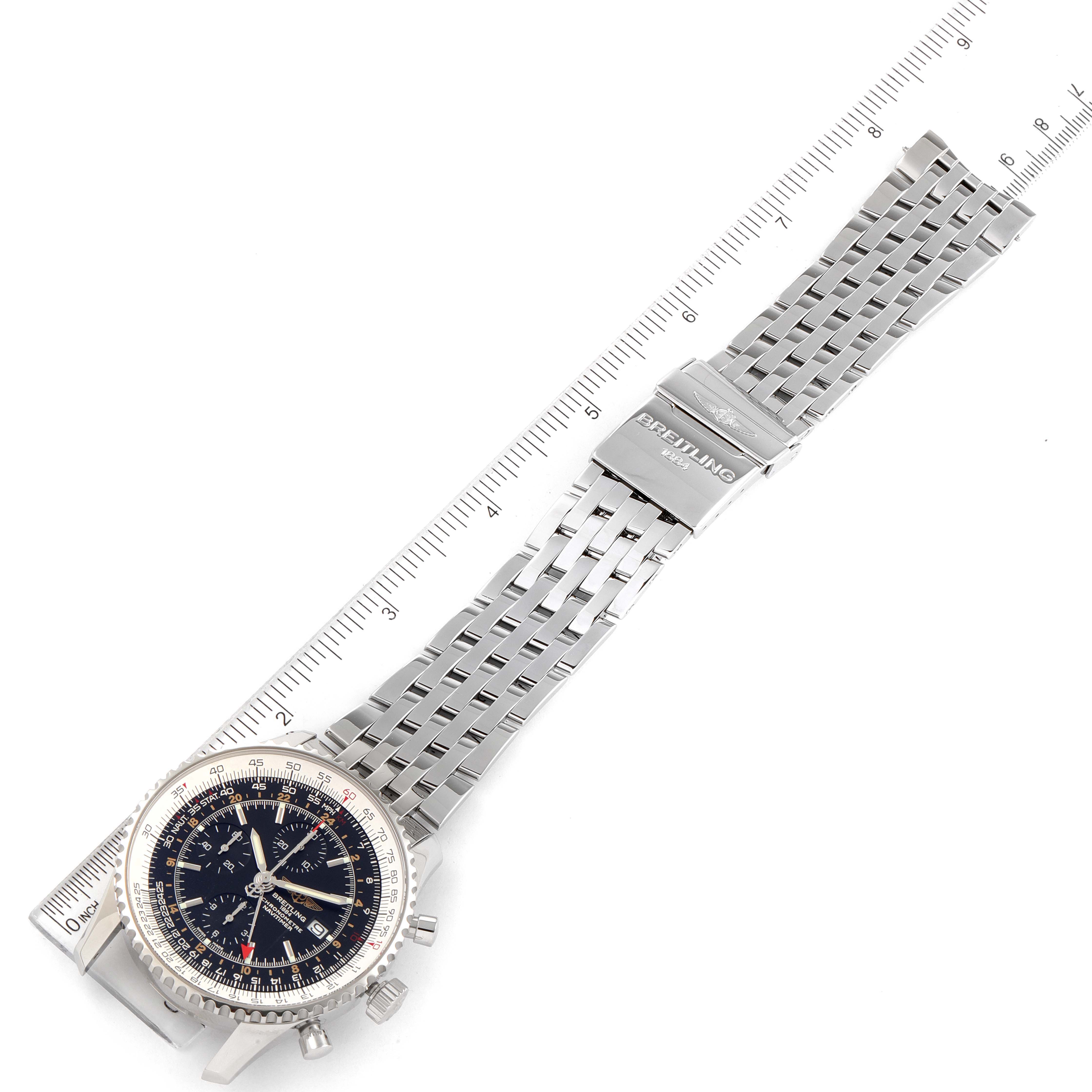 The Breitling Navitimer A24322 Men's Stainless Steel Black Dial A24322 Men's Stainless Steel Black Dial watch is shown flat with a full view of its face, stainless steel bracelet, and clasp, positioned next to a ruler for scale.