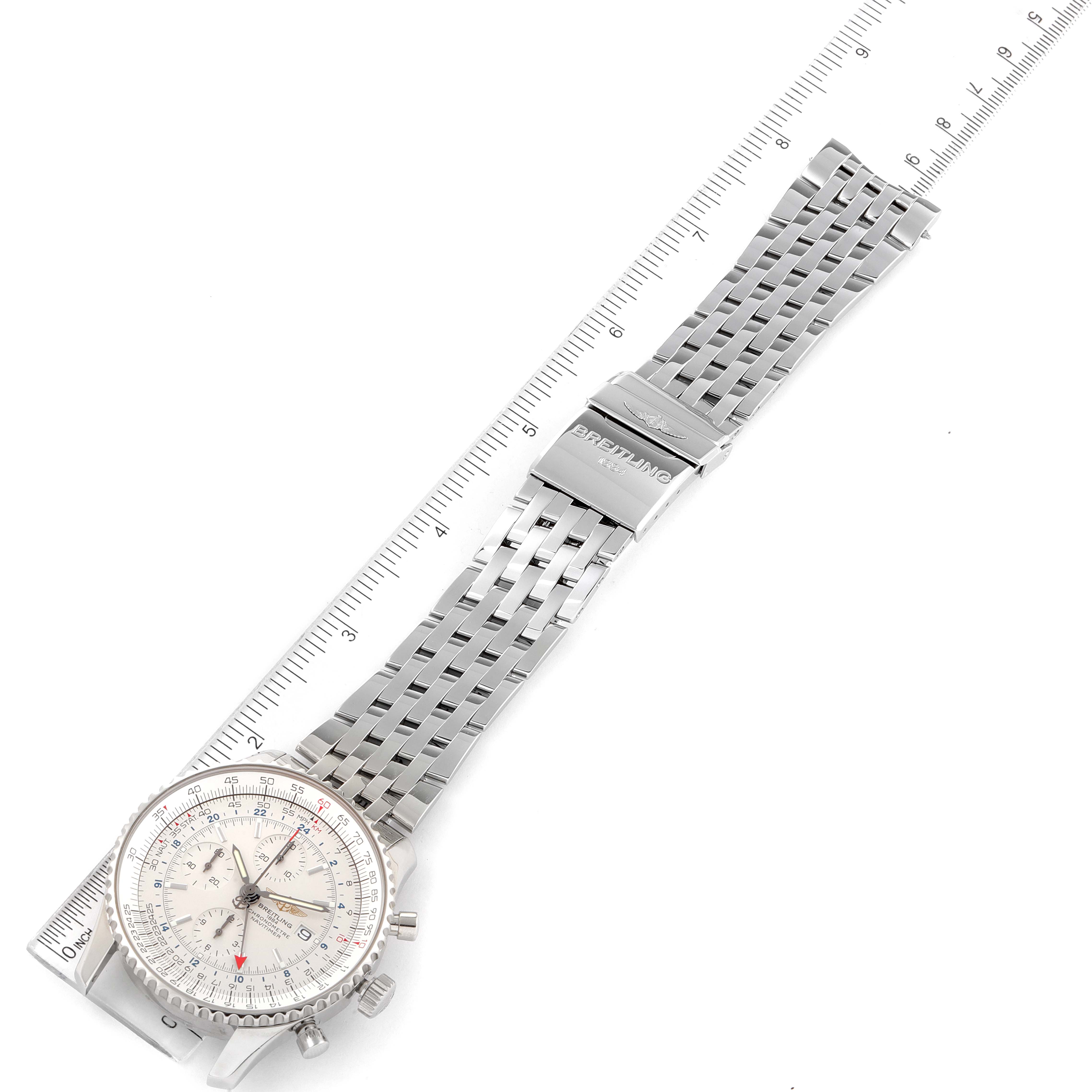 The image shows a top view of a Breitling Navitimer A24322 Men's Stainless Steel Silver Dial A24322 Men's Stainless Steel Silver Dial watch, focusing on its face, bracelet, and clasp, laid against a ruler.