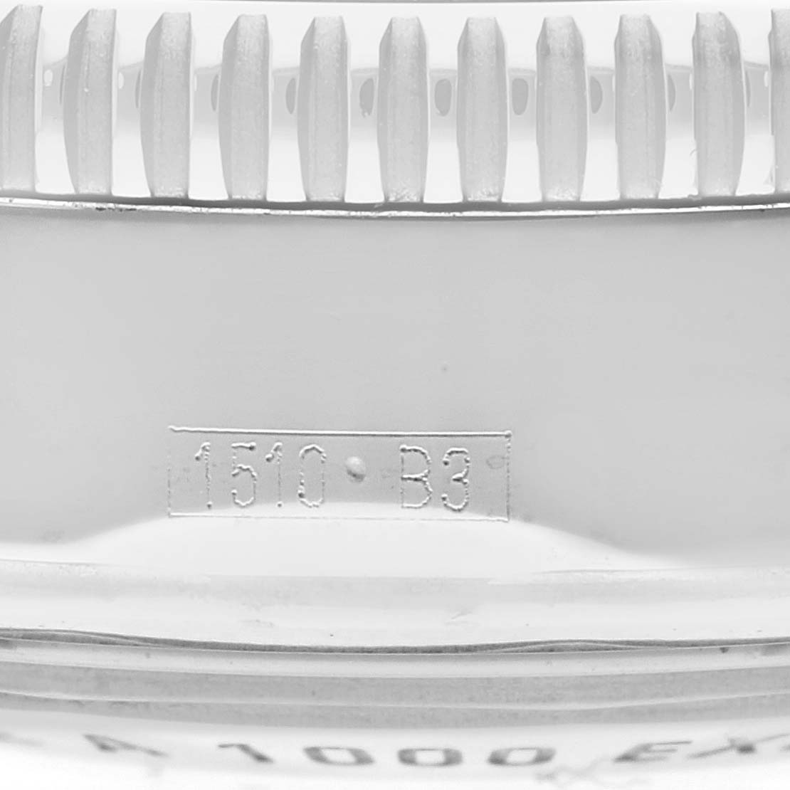 The image shows the side view of a Breitling Superocean A13320 Men's Stainless Steel Black Dial A13320 Men's Stainless Steel Black Dial watch bezel, featuring its knurling and the model number "1510 B3."