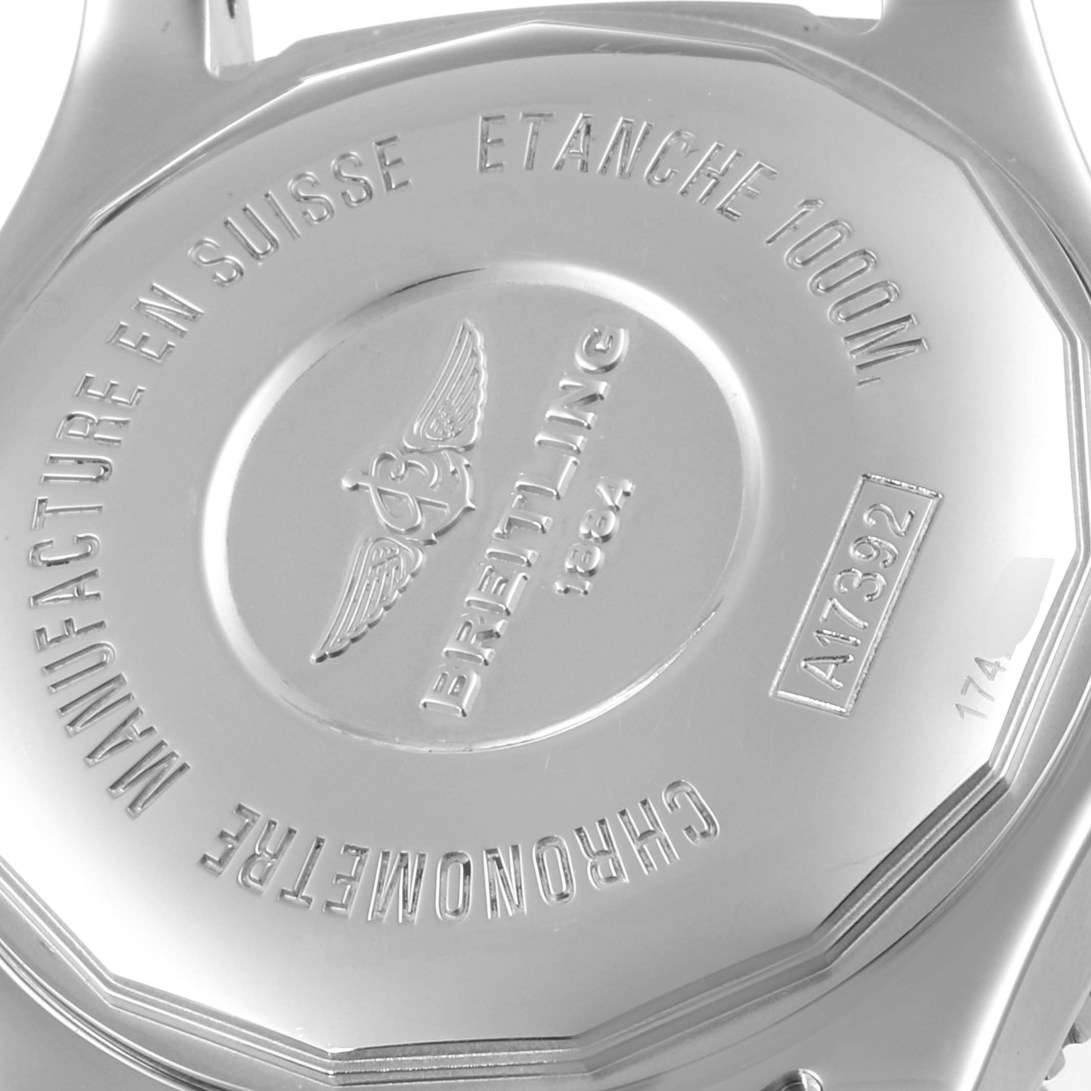 The image shows the back case of a Breitling Superocean A17392 Men
s Stainless Steel Blue Dial A17392 Men
s Stainless Steel Blue Dial watch, highlighting engravings and branding details.