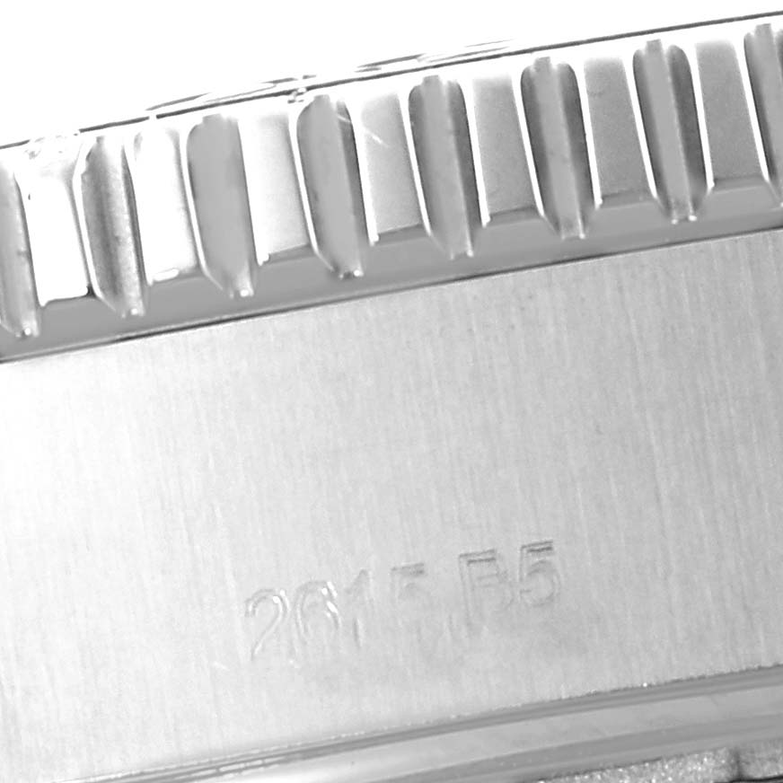 The image shows a close-up of the engraved case and textured bezel of a Breitling Superocean A17392 Men
s Stainless Steel Blue Dial A17392 Men
s Stainless Steel Blue Dial watch.