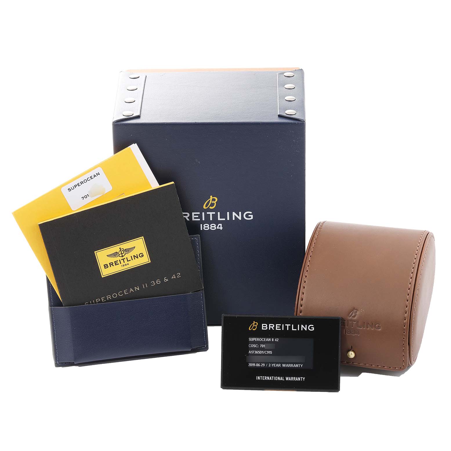This image shows the packaging, manuals, warranty card, and a leather watch case for the Breitling Superocean A17365 Men's Stainless Steel Blue Dial A17365 Men's Stainless Steel Blue Dial model.