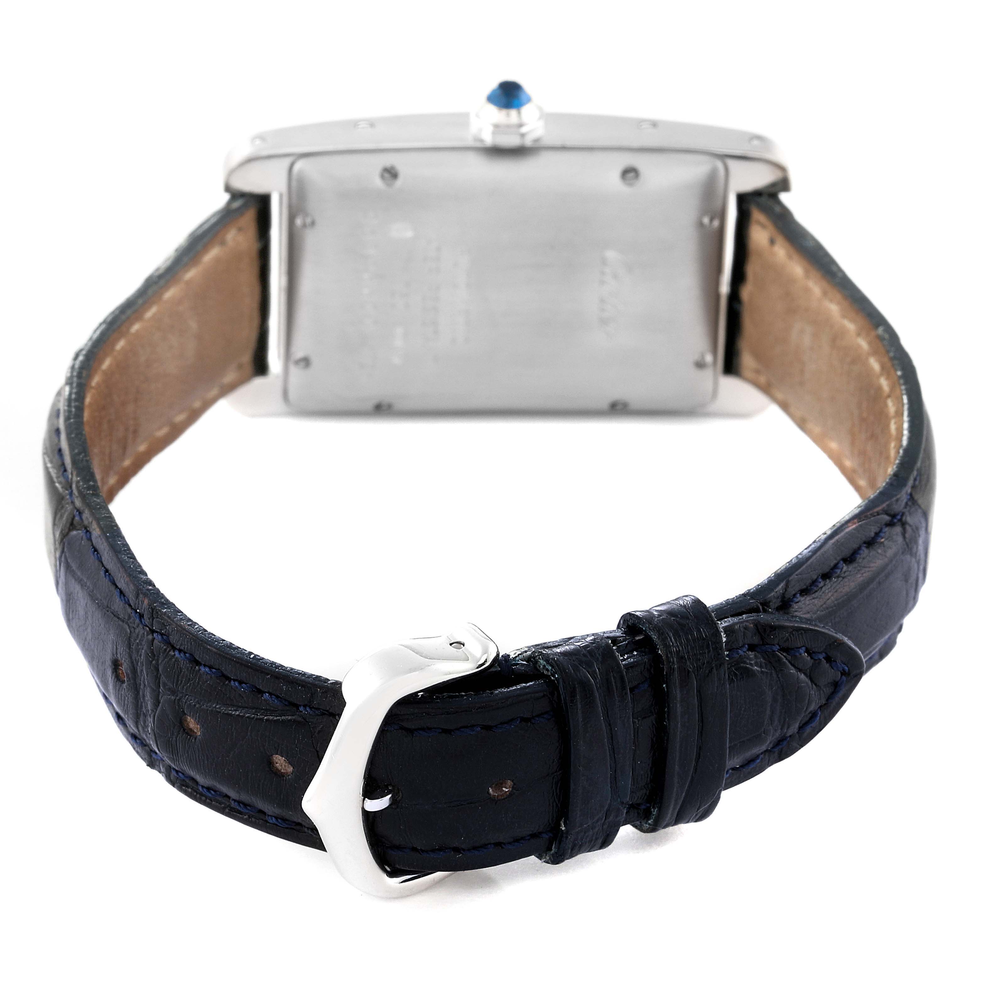 This image shows the back case and leather strap of the Cartier Tank Americaine W2603656 Women
s White Gold Silver Dial W2603656 Women
s White Gold Silver Dial watch, viewed from a rear angle.