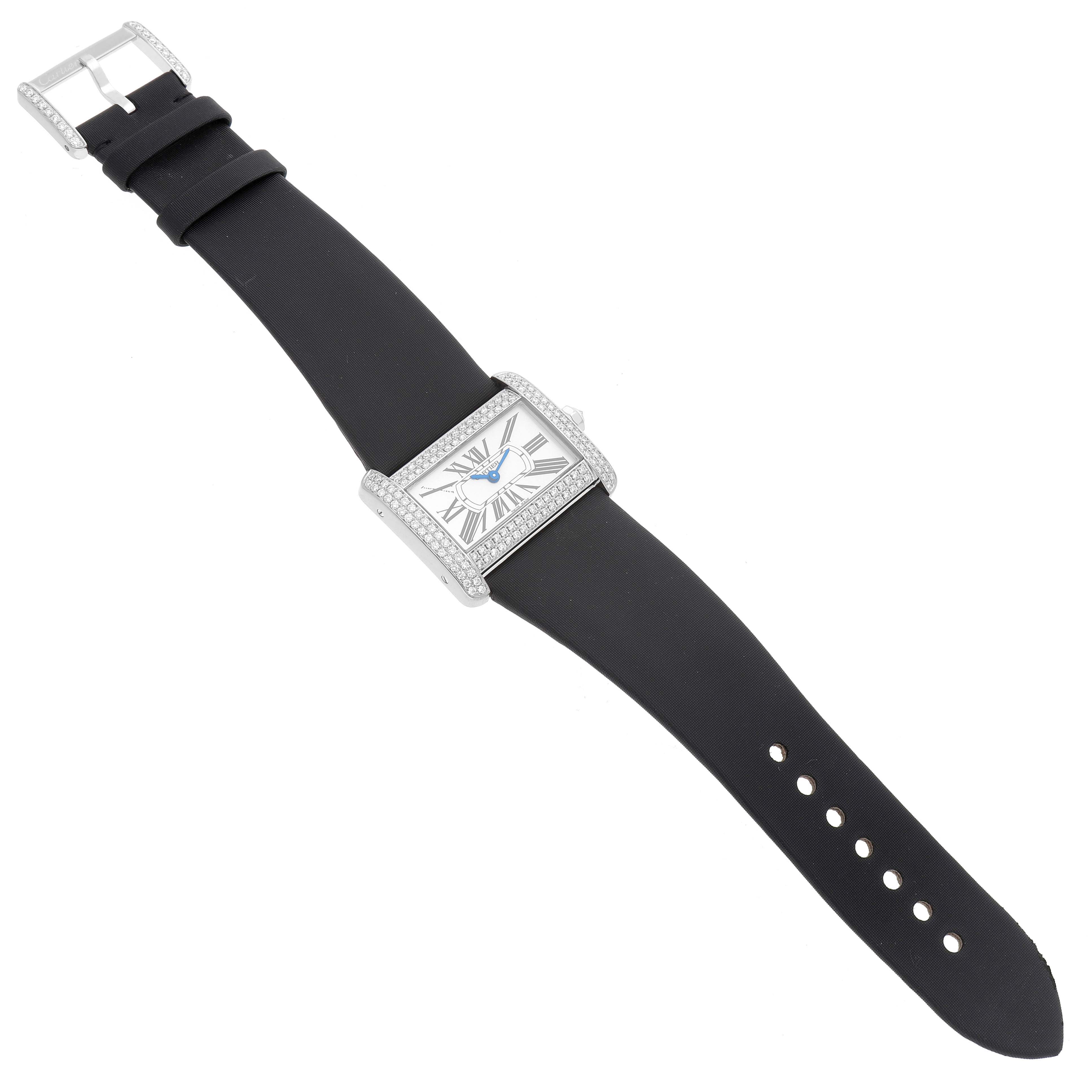 The Cartier Tank Divan WA301271 Women's White Gold Silver Dial watch is shown from a top view, displaying its face, case, and full strap.