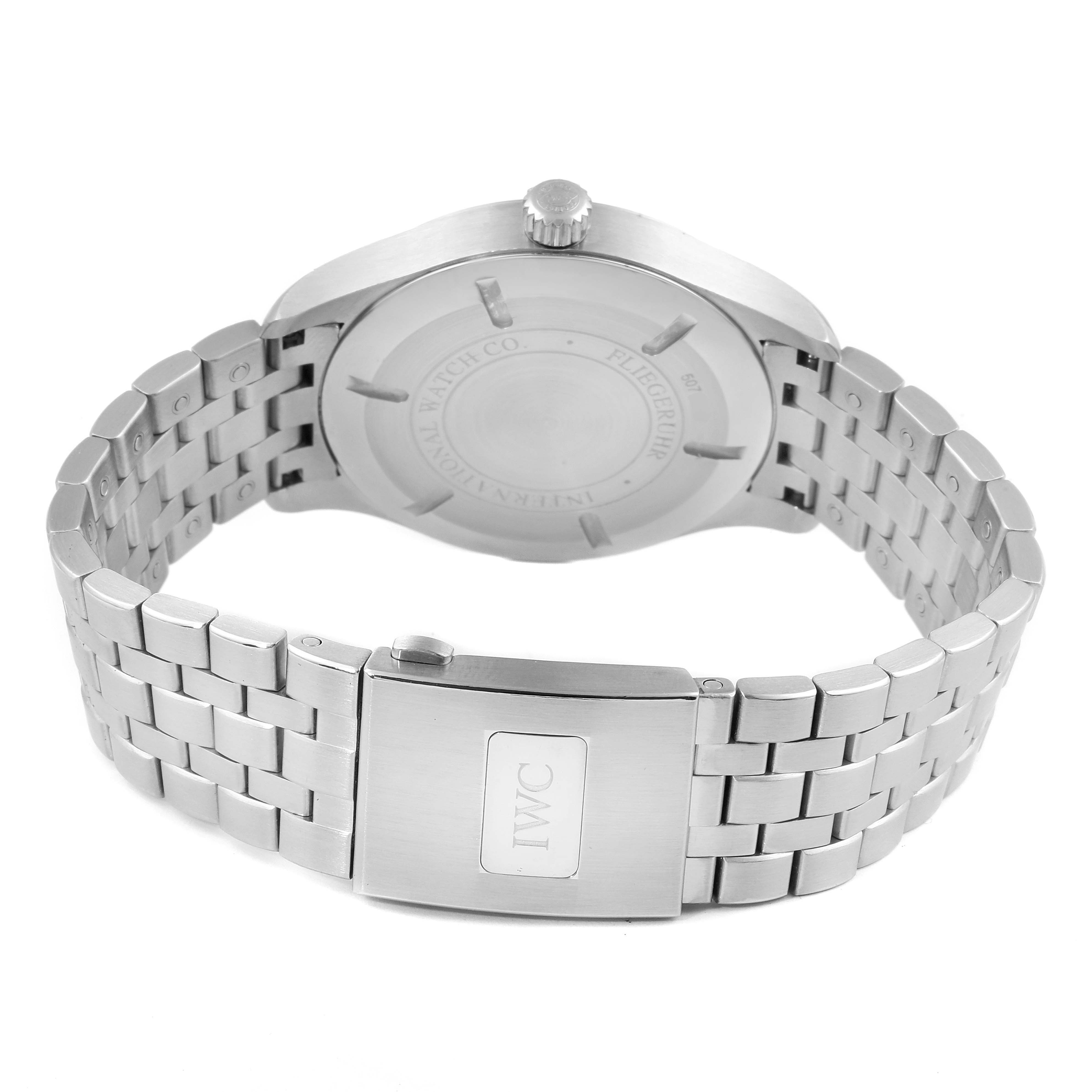 The image shows the back view of an IWC Pilot IW326504 Men's Stainless Steel Black Dial IW326504 Men's Stainless Steel Black Dial model watch, focusing on the case back and stainless steel bracelet with a clasp.