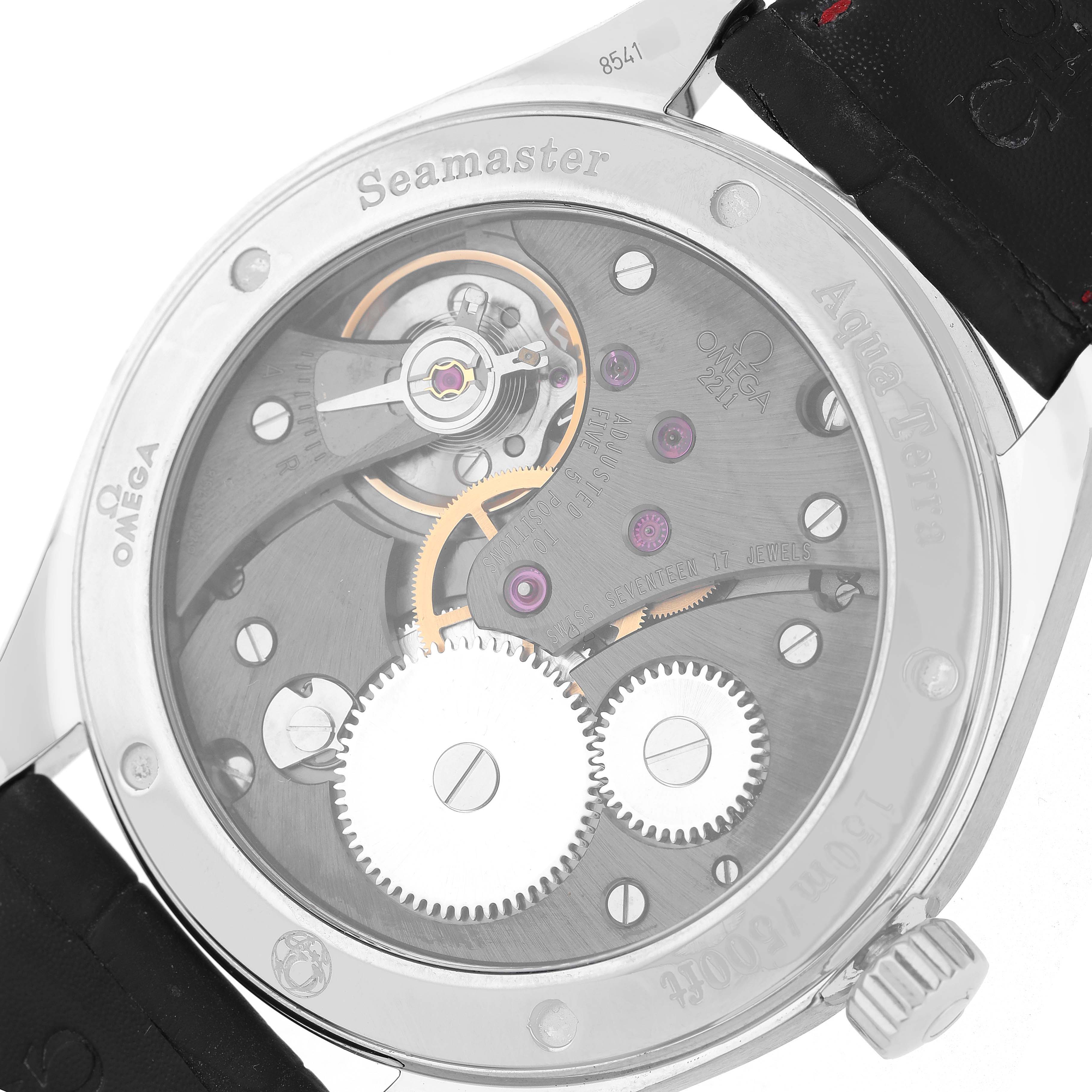 The Omega Seamaster 231.13.49.10.06.001 Men's Stainless Steel Grey Dial watch is shown from the back, highlighting its internal mechanical movements and gear details.