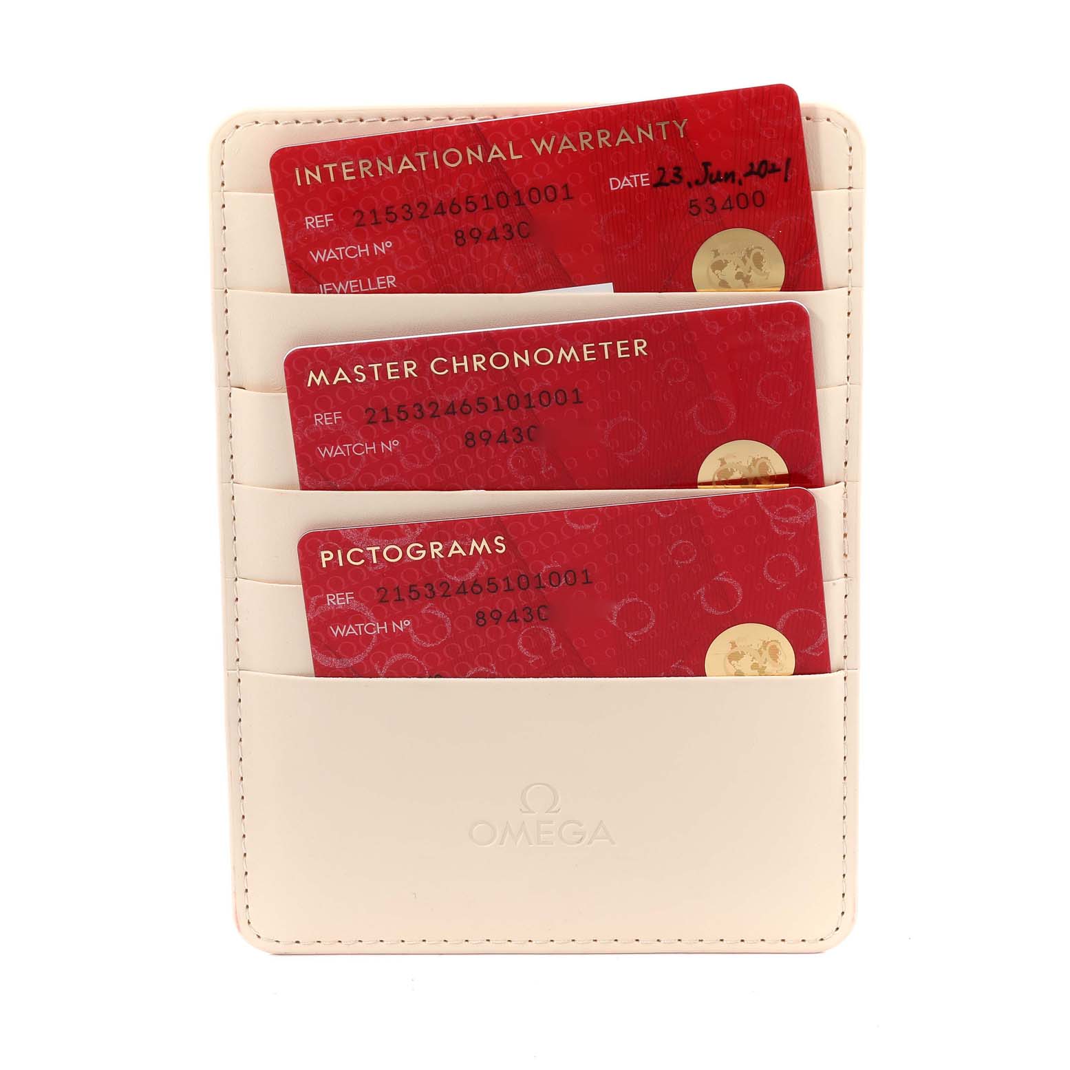 The image shows the warranty, master chronometer, and pictograms cards for an Omega Planet Ocean 215.32.46.51.01.001 Men's Stainless Steel Black Dial 215.32.46.51.01.001 Men's Stainless Steel Black Dial watch.